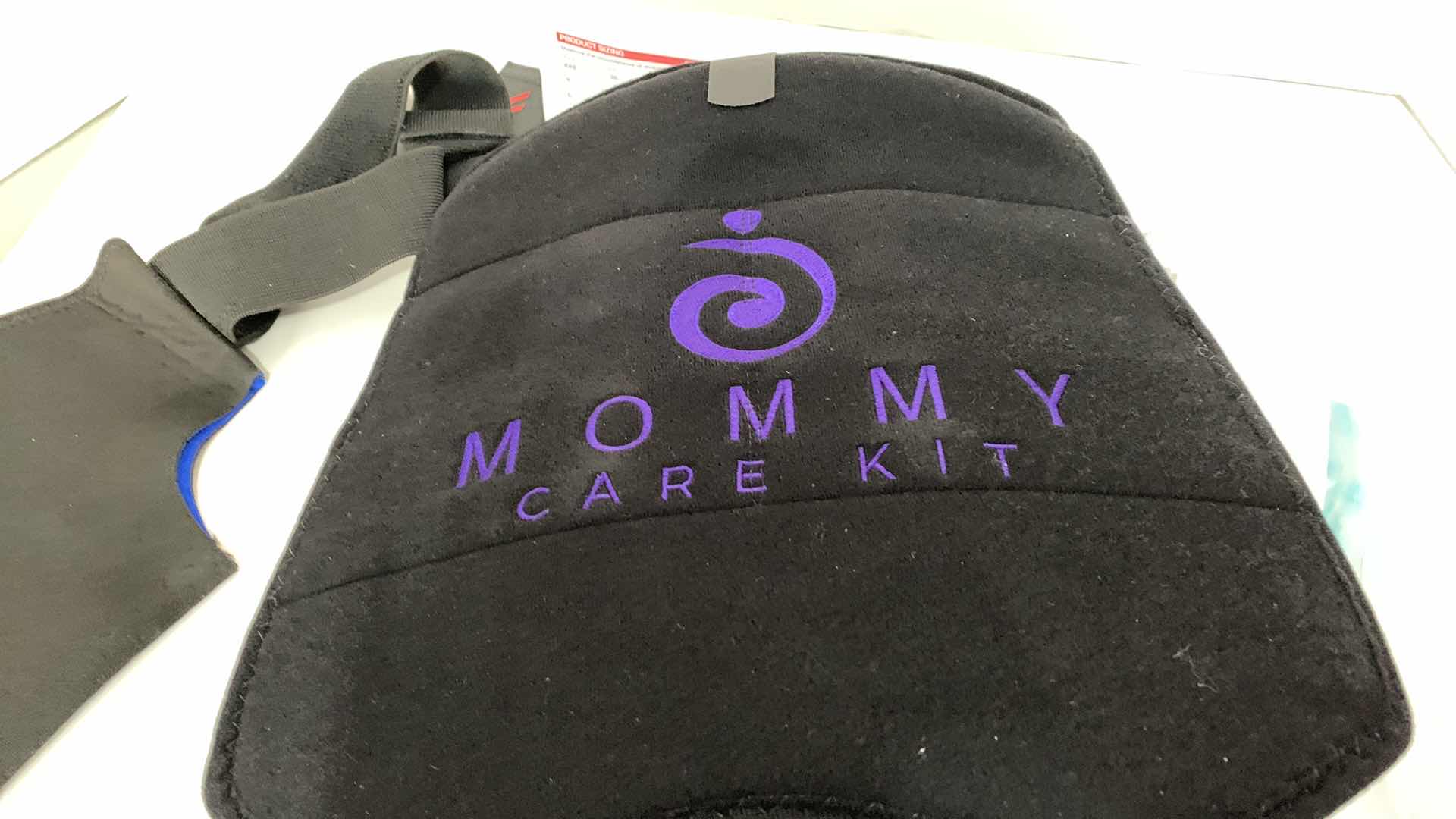 Photo 1 of 3-ANKLE BRACES AND A BACK BRACE