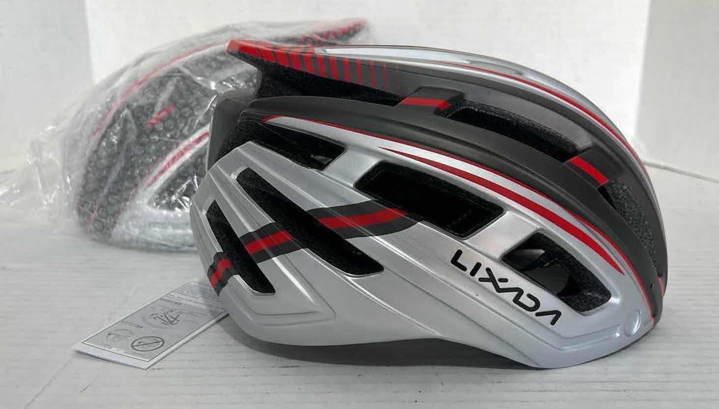 Photo 1 of 2-BIKE HELMETS