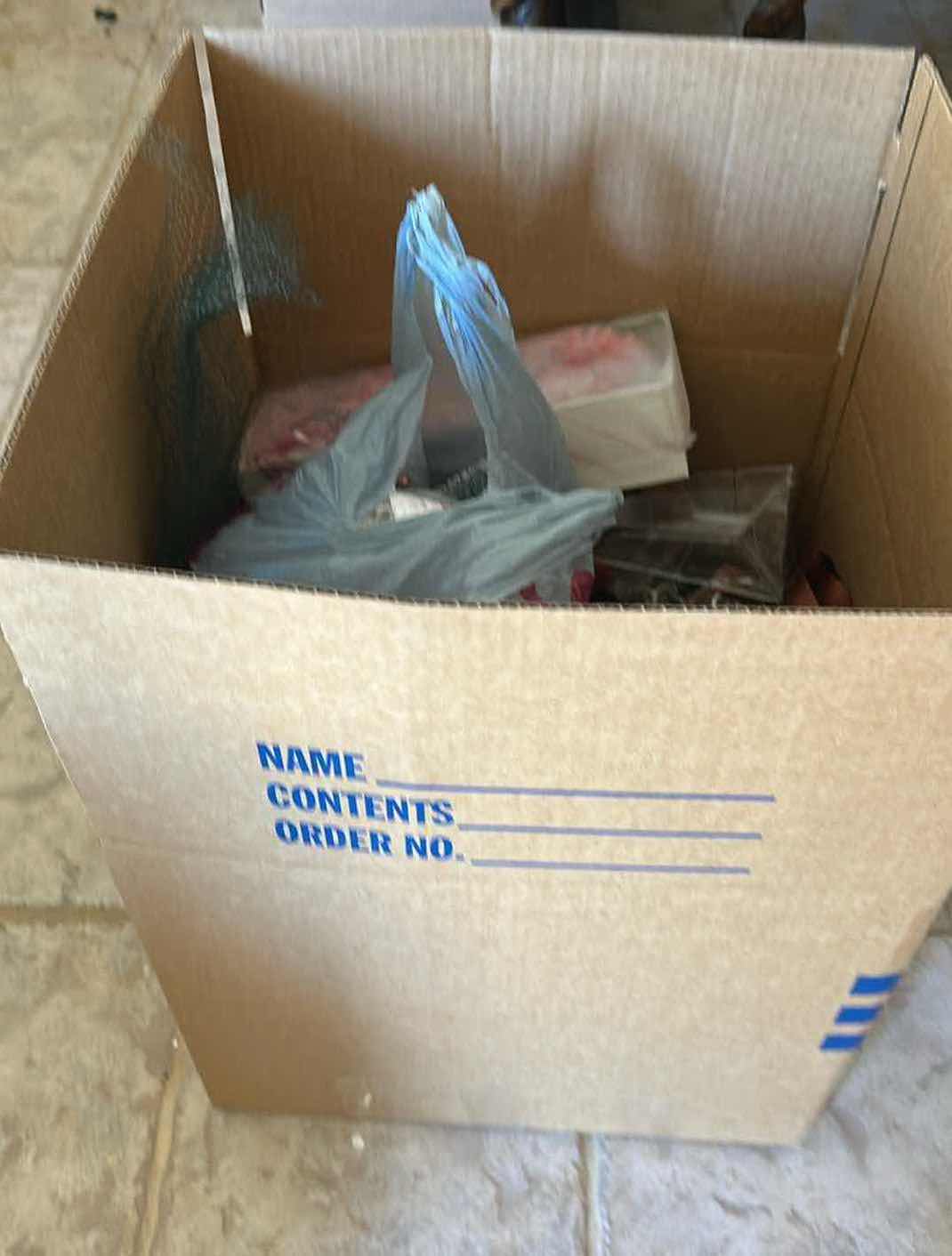 Photo 3 of CONTENTS OF BOX-RIBBON AND CORD.