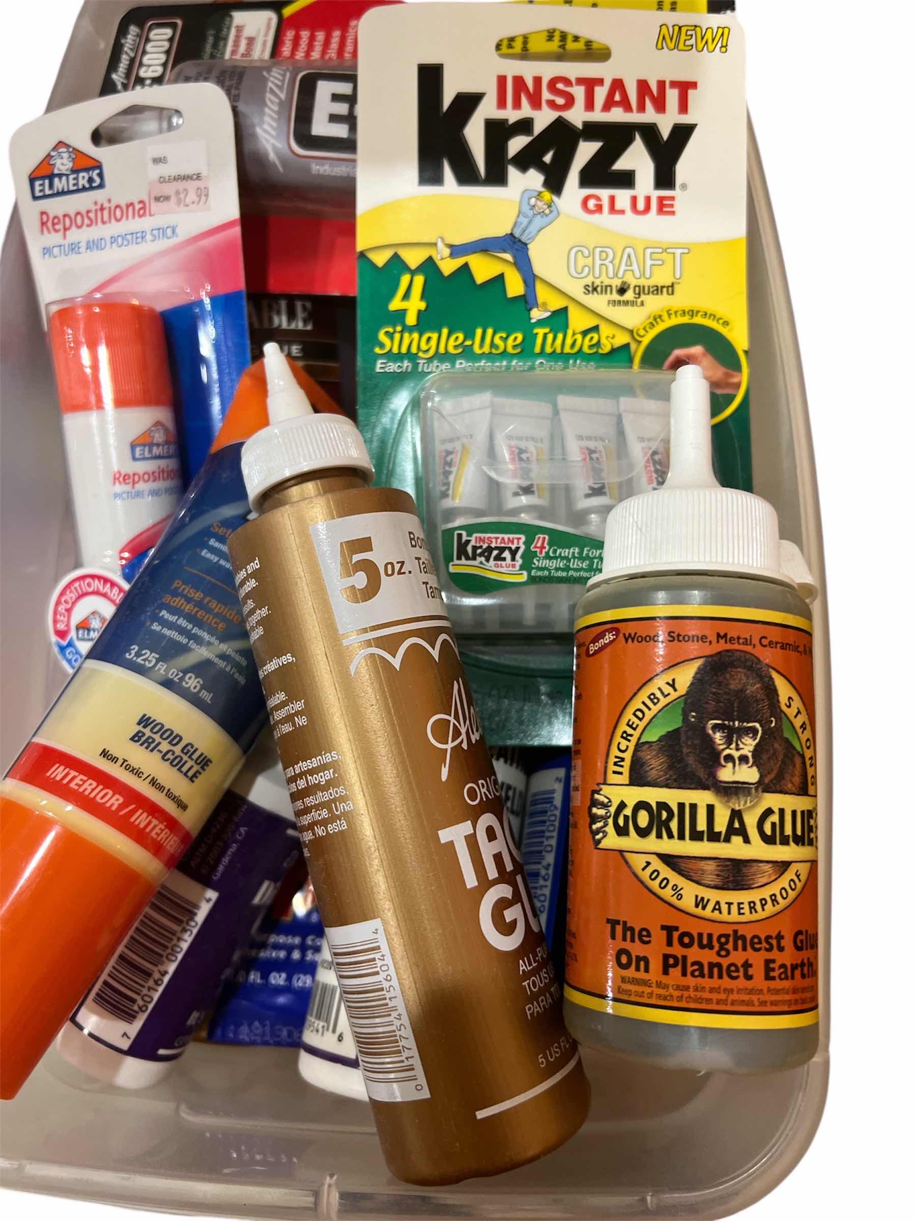 Photo 1 of BOX OF GLUE FOR VARIOUS CRAFTING AND HOME APPLICATION USES