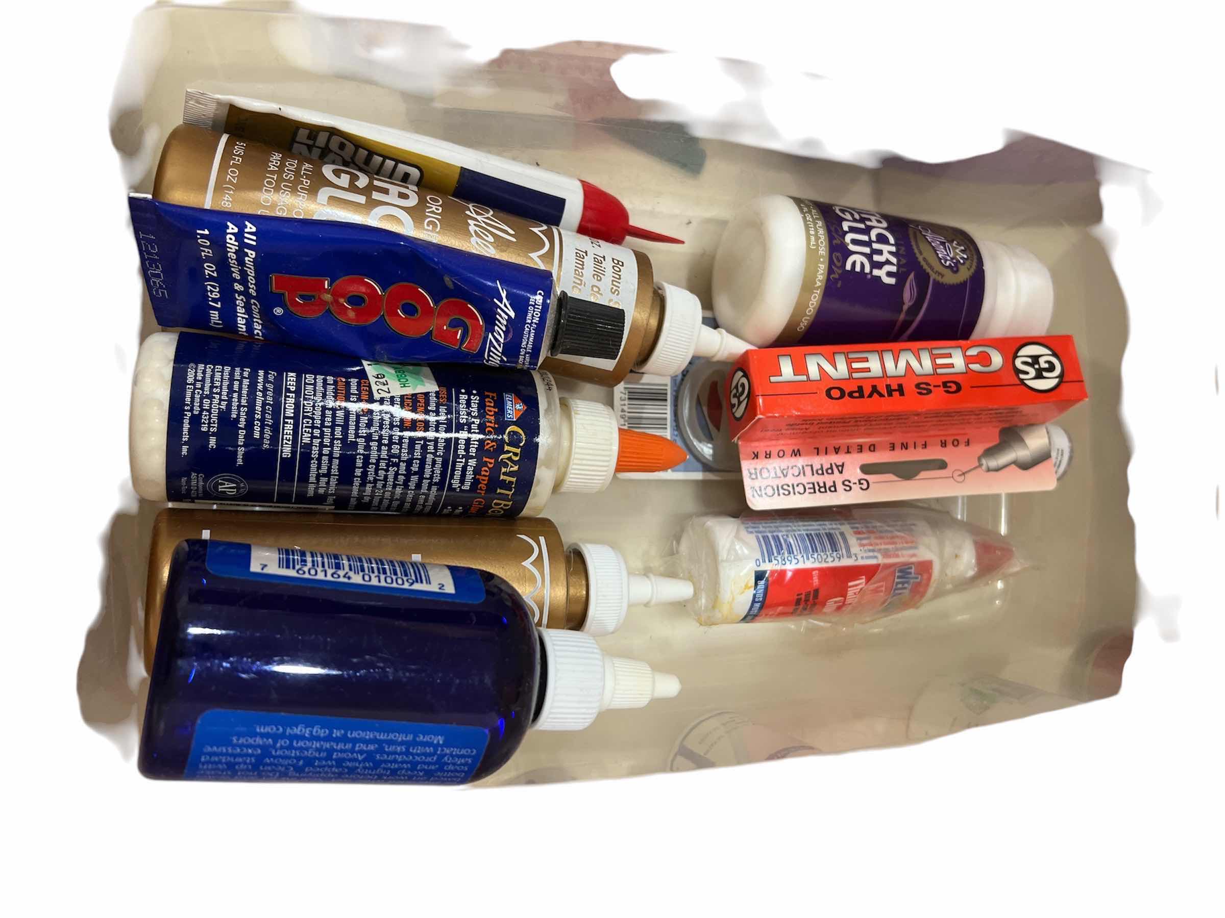 Photo 1 of BOX OF GLUE FOR VARIOUS CRAFTING AND HOME APPLICATION USES