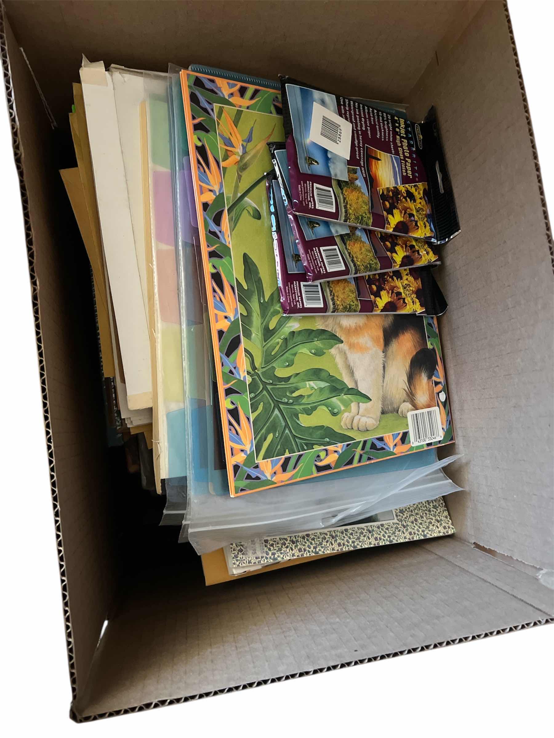 Photo 1 of BOX OF OFFICE SUPPLIES - NOTE BOOKS, SPECIALTY PAPER AND MORE