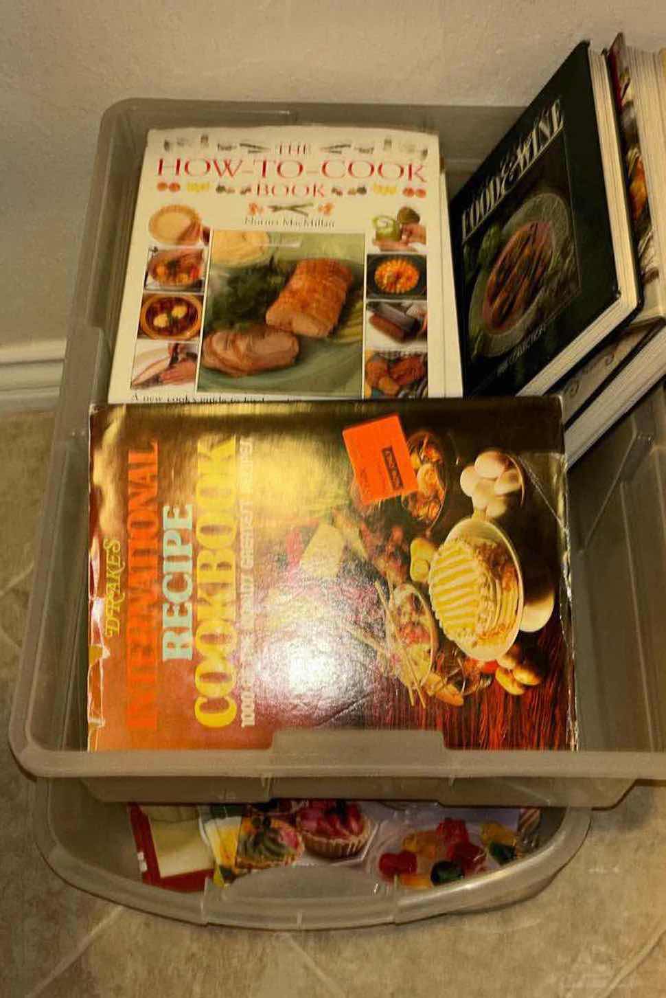 Photo 1 of 2- CONTAINERS OF ASSORTED COOKBOOKS