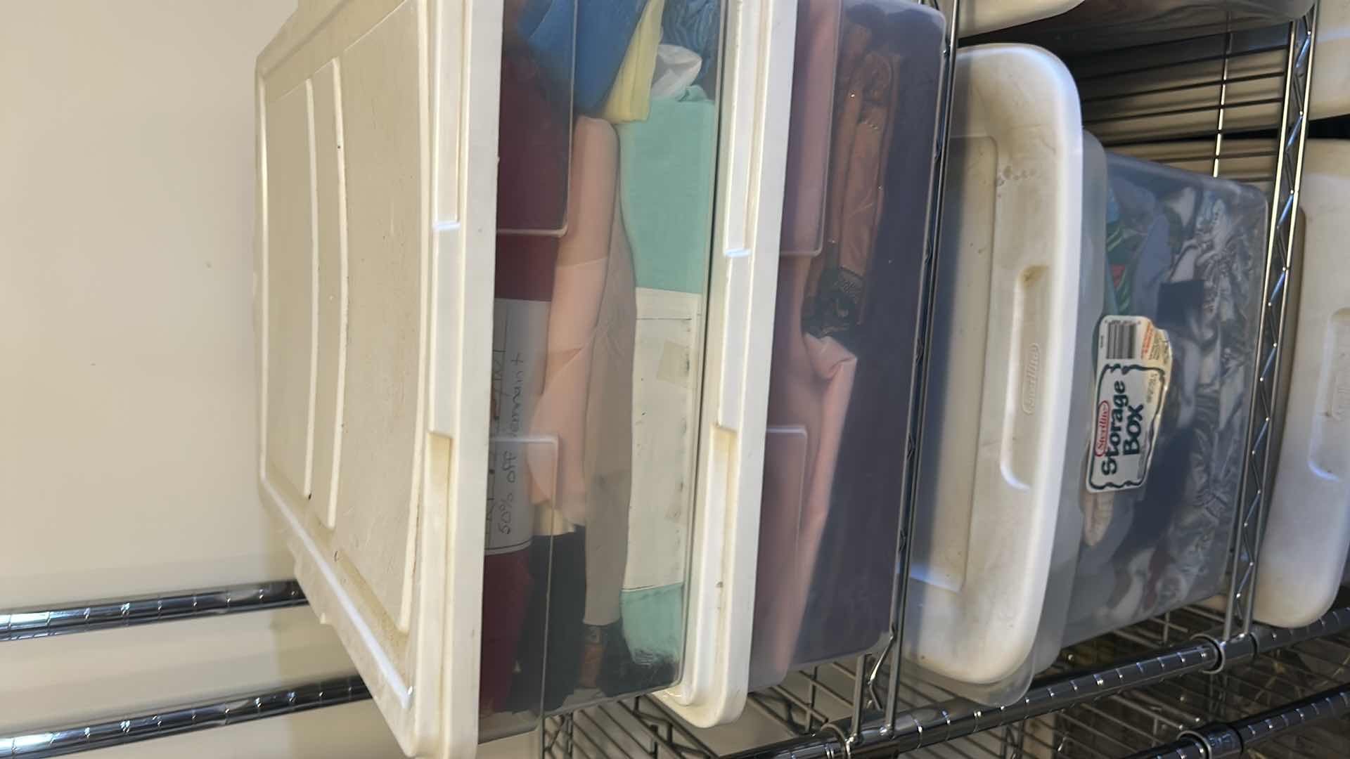 Photo 1 of 6- PLASTIC CONTAINERS OF ASSORTED FABRIC