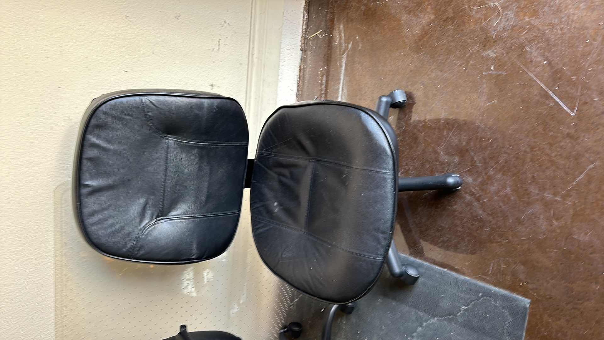 Photo 1 of 2- BLACK OFFICE CHAIRS AND PLASTIC MAT