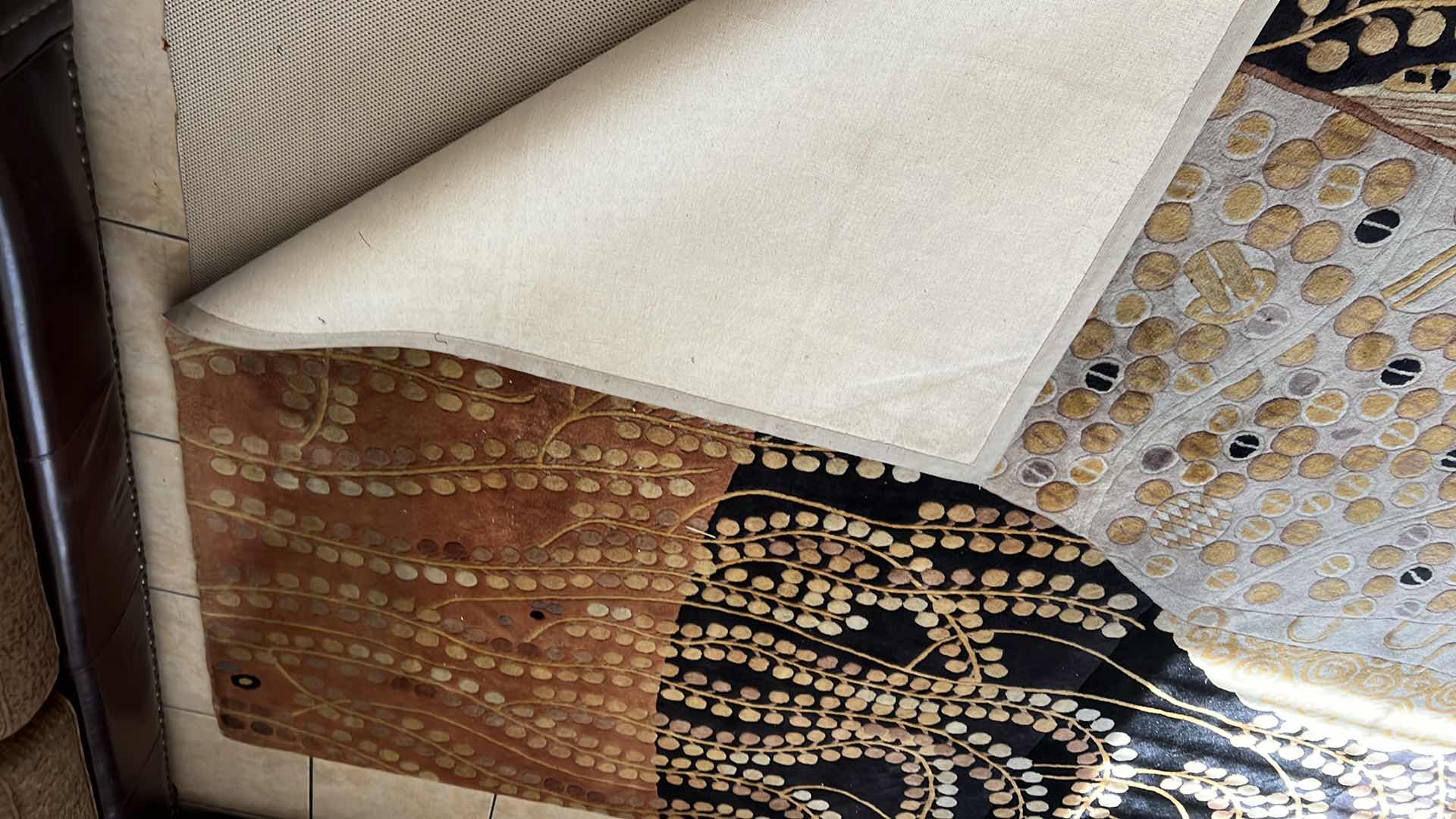 Photo 1 of EARTH-TONE PATTERN AREA RUG 93" x 134"