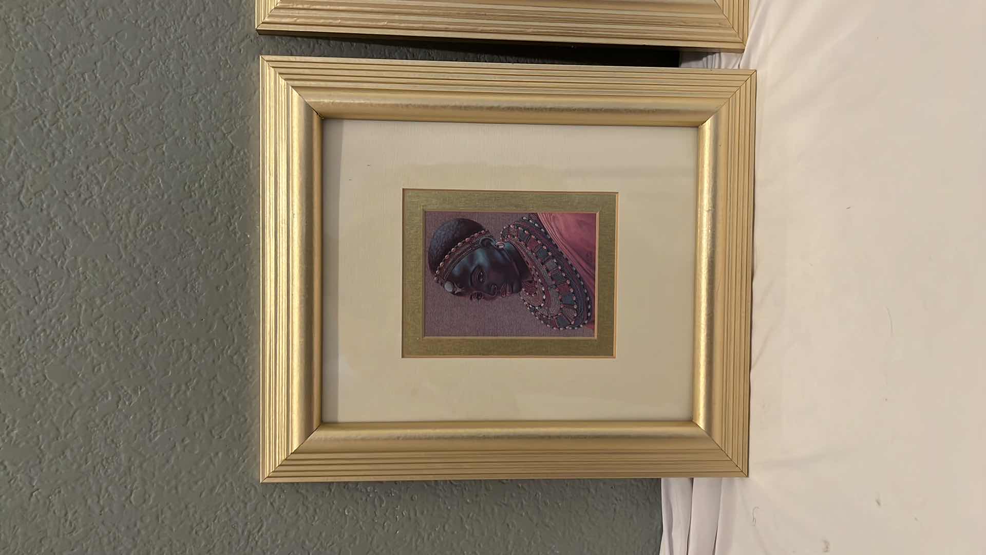 Photo 1 of 2-GOLD FRAMED "AFRICAN FIGURES" ARTWORK 11" x 13"