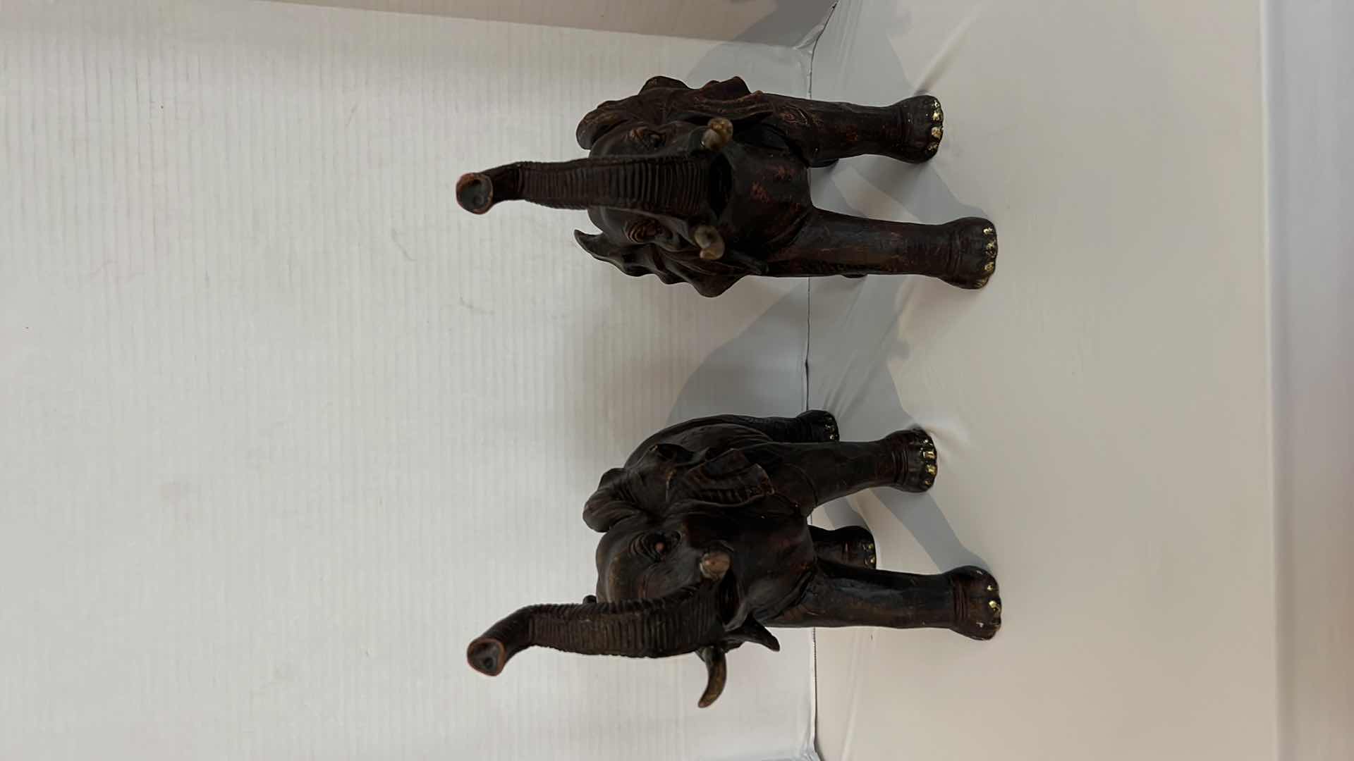 Photo 1 of 2-BLACK W COPPER RESIN ELEPHANT FIGURES W15" H13"