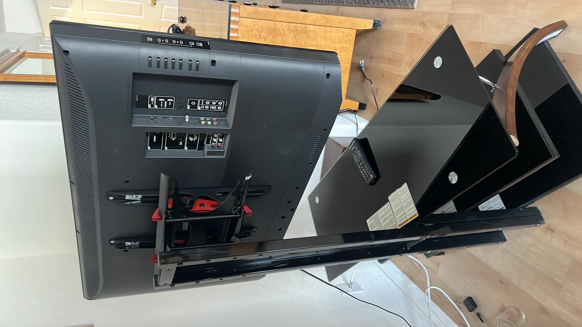 Photo 1 of 40" HITACHI TV W REMOTE ON SMOKED GLASS SWIVEL ARM ENTERTAINMENT CENTER