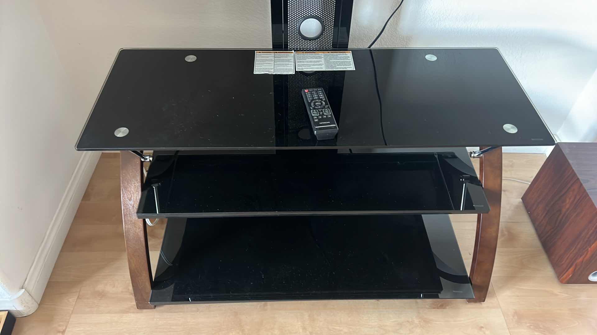 Photo 1 of 40" HITACHI TV W REMOTE ON SMOKED GLASS SWIVEL ARM ENTERTAINMENT CENTER