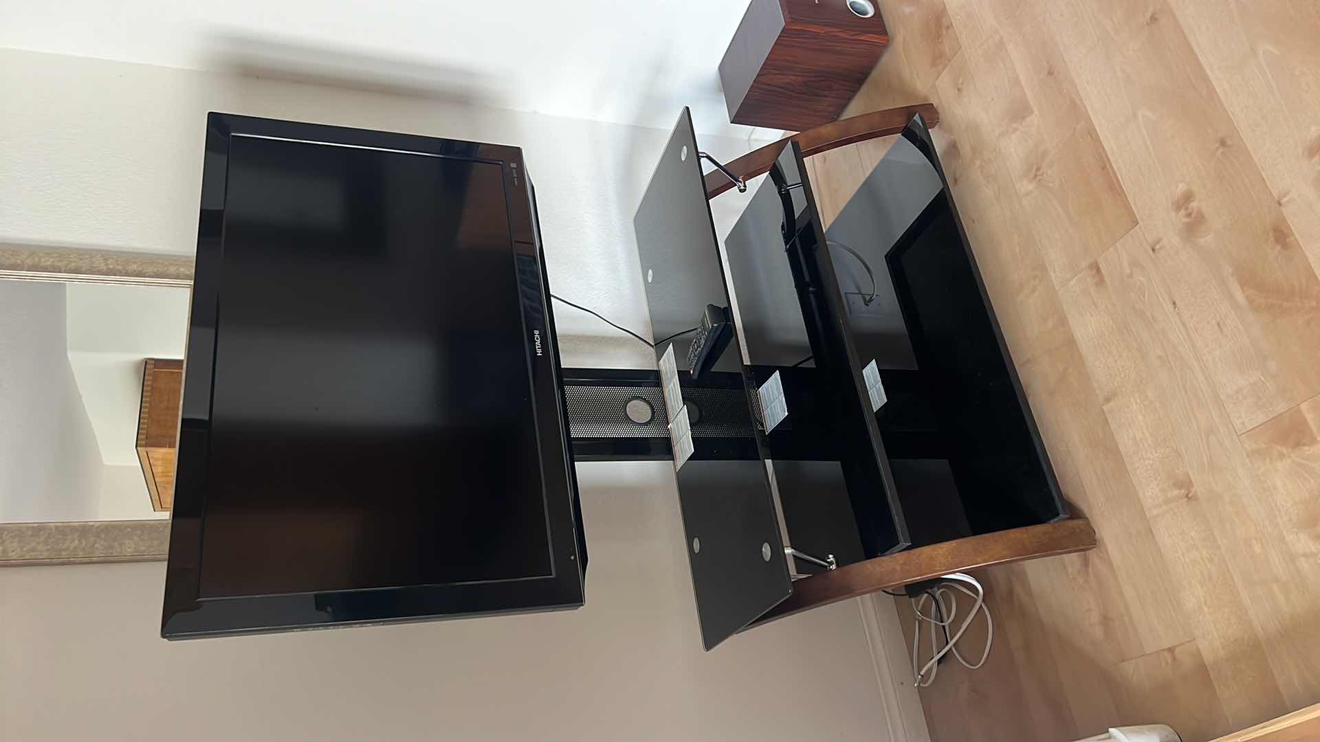 Photo 1 of 40" HITACHI TV W REMOTE ON SMOKED GLASS SWIVEL ARM ENTERTAINMENT CENTER