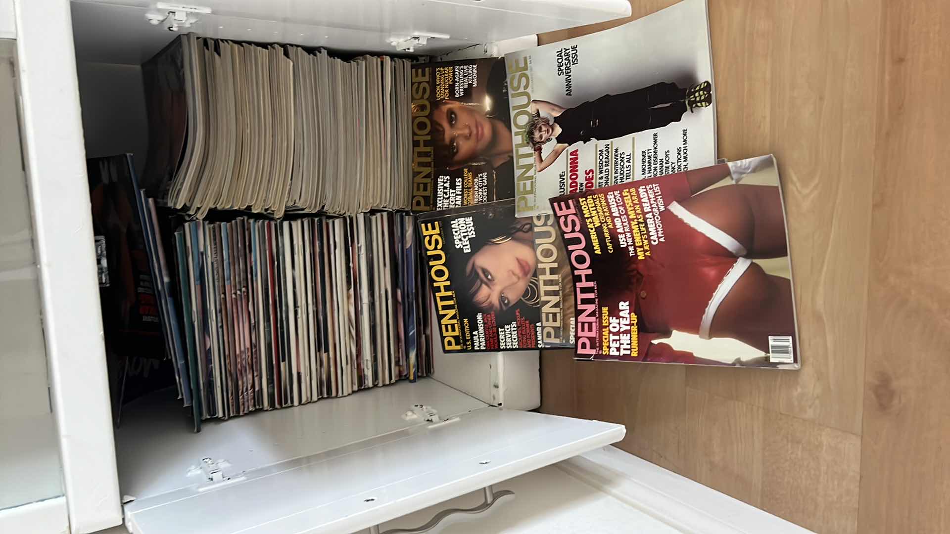 Photo 1 of CONTENTS OF 2 OFFICE CABINETS-VARIOUS OLD PENTHOUSE MAGAZINES