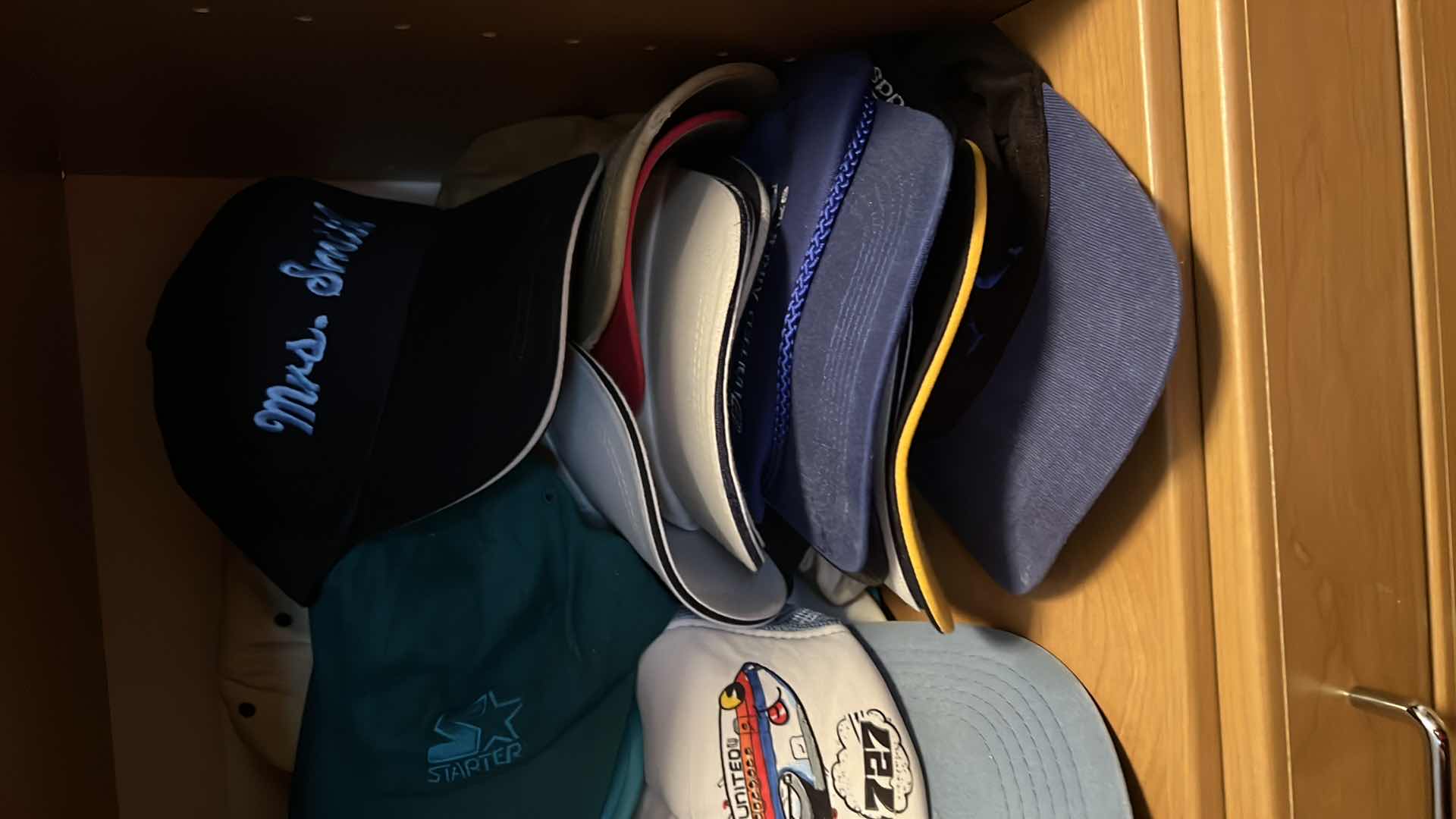 Photo 1 of CONTENTS OF CLOSET SHELF-MEN'S CAPS/HATS