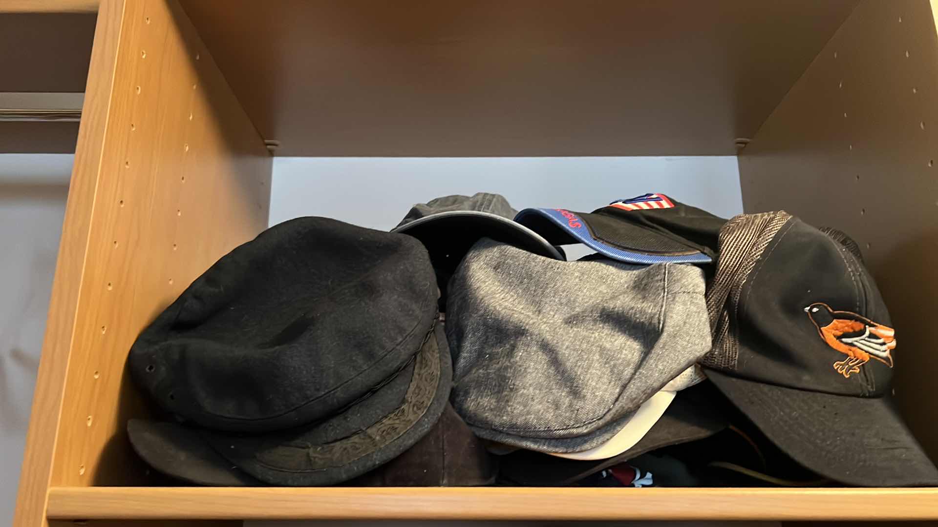 Photo 1 of CONTENTS OF CLOSET SHELF-MEN'S CAPS/HATS