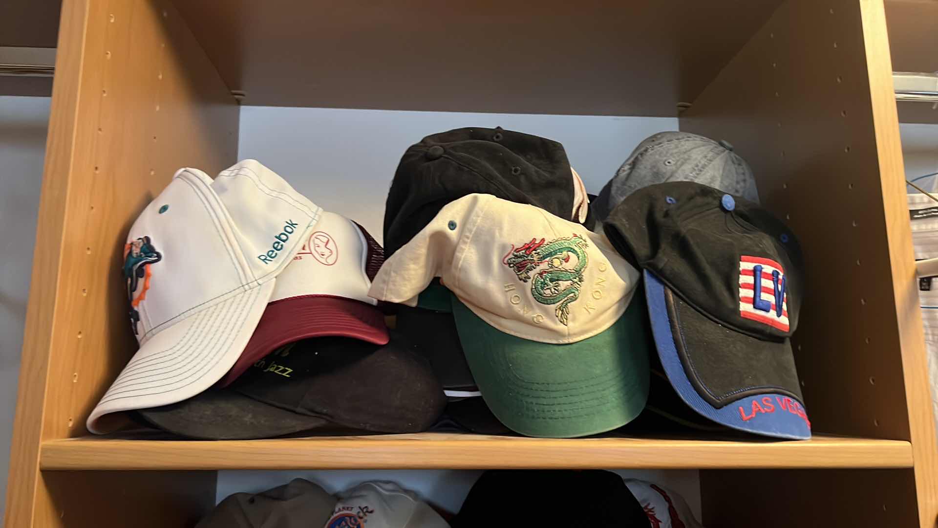 Photo 1 of CONTENTS OF CLOSET SHELF-MEN'S CAPS/HATS