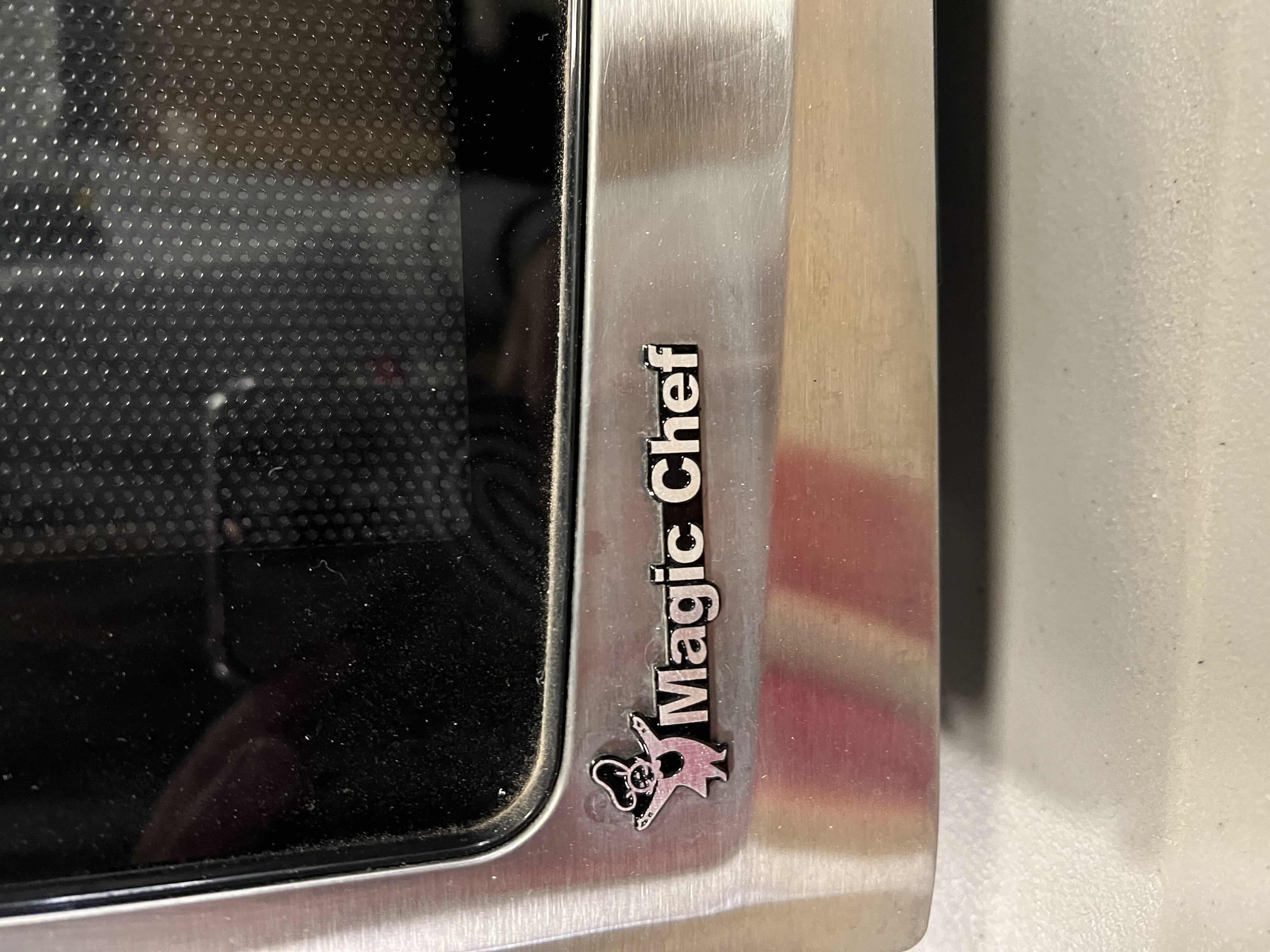 Photo 1 of COUNTER TOP STAINLESS STEEL MICROWAVE BY MAGIC CHEF. 1.6'CU FT 2500WATT