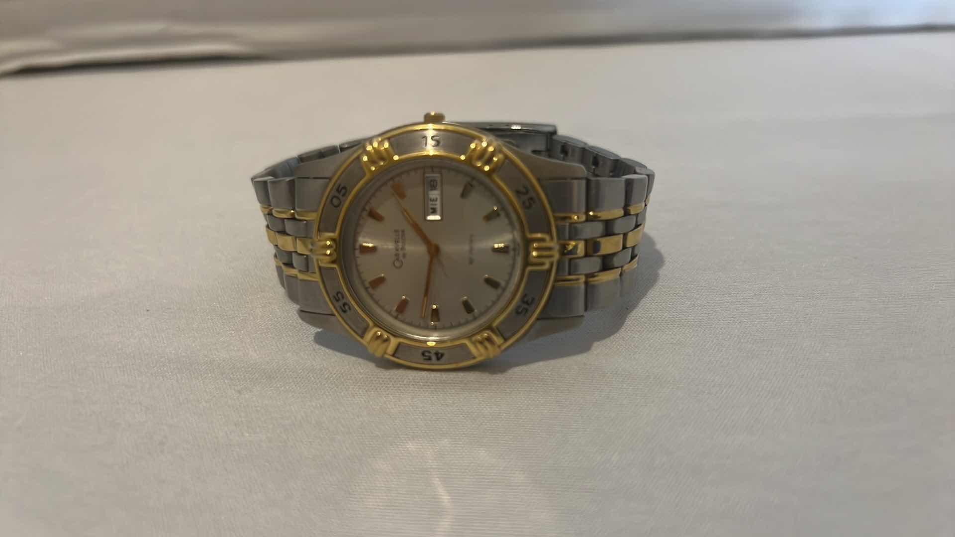 Photo 1 of CARAVELLE BULIVA WATCH UNISEX SILVER GOLD TONE DATE WATCH