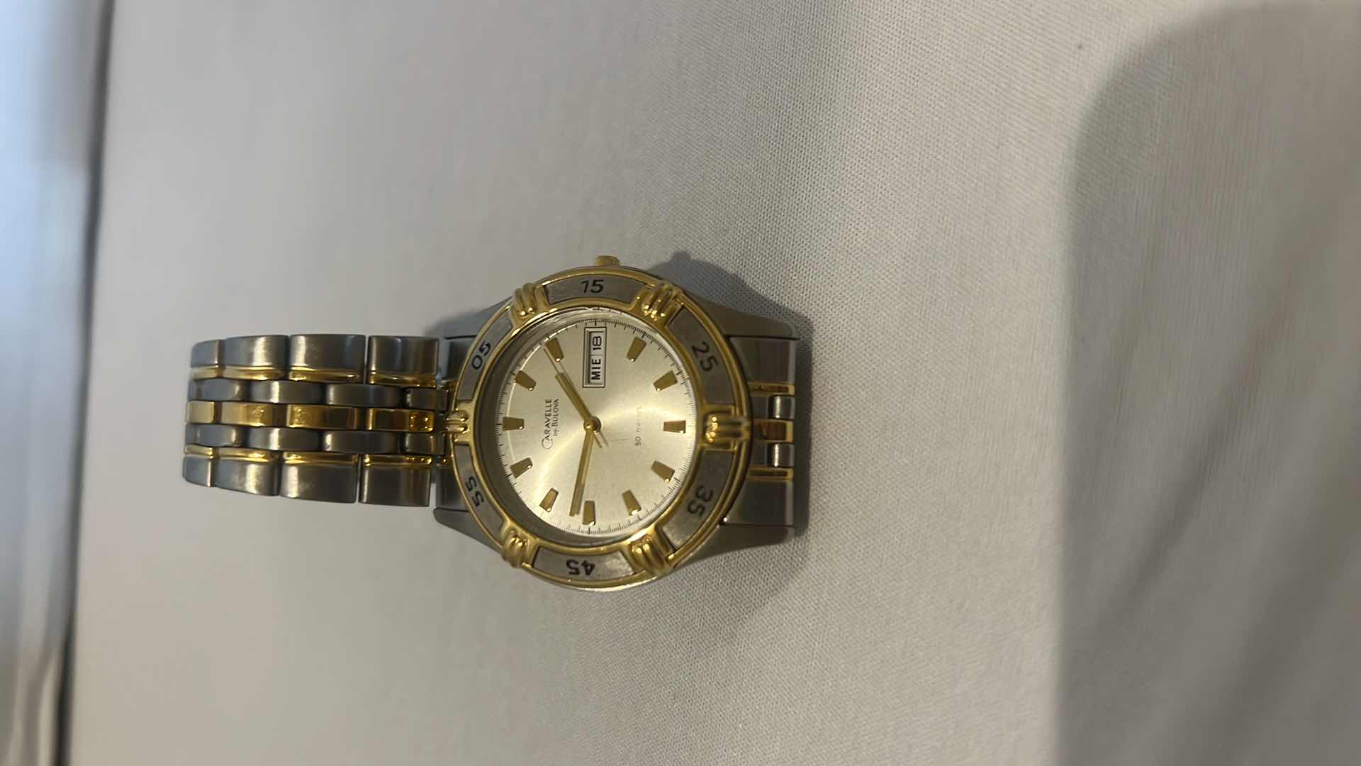 Photo 1 of CARAVELLE BULIVA WATCH UNISEX SILVER GOLD TONE DATE WATCH