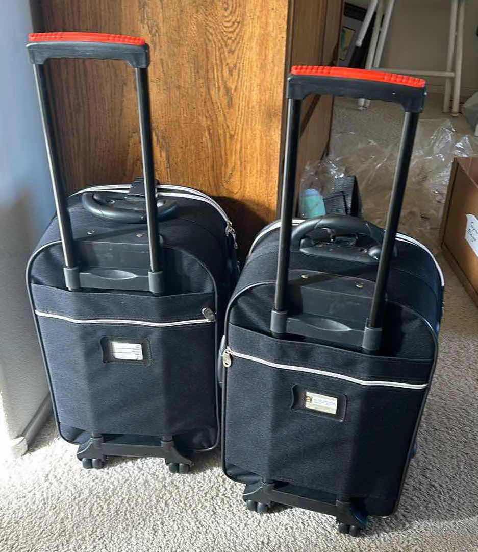 Photo 1 of 2 SUITCASES