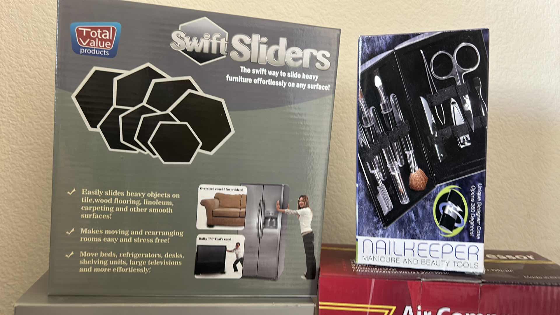 Photo 1 of 4 NEW BOXED ITEMS - BINOCULARS, FURNITURE SLIDERS, AIR COMPRESSOR AND MANICURE SET