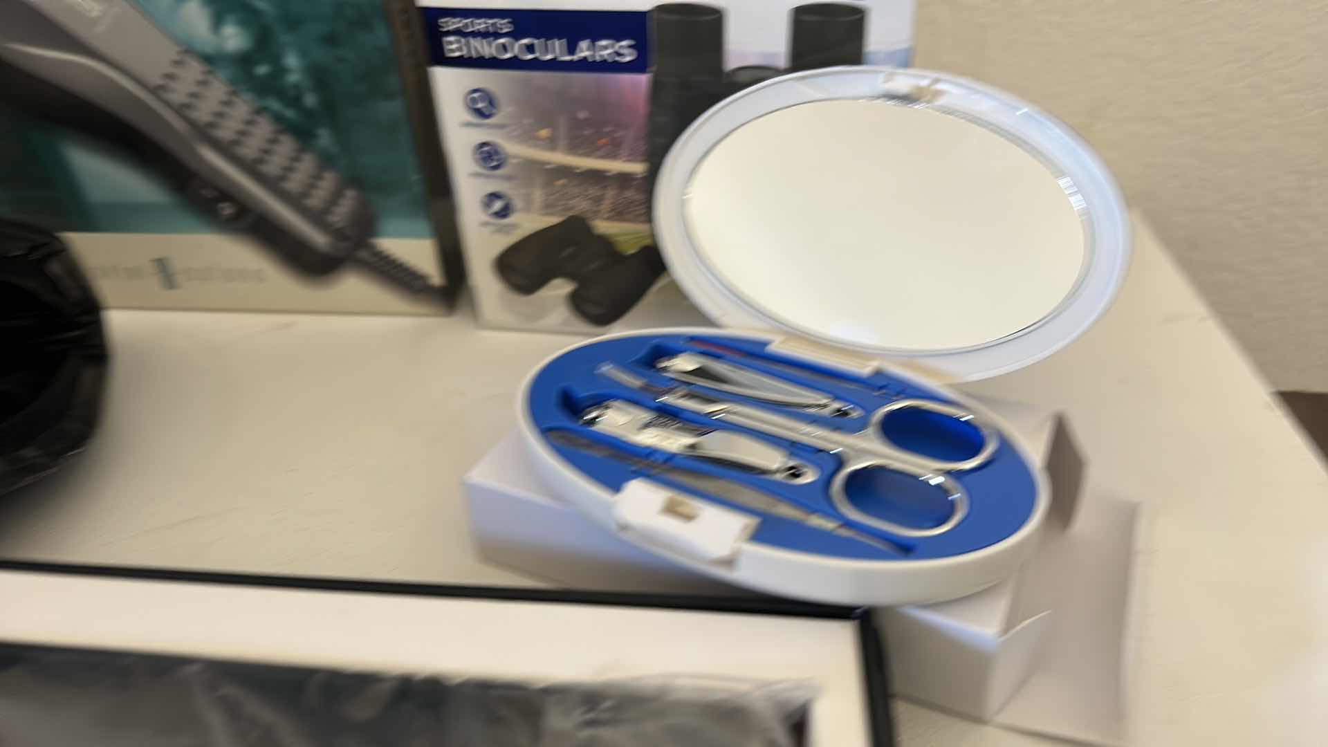 Photo 1 of 5 NEW ITEMS- PROFESSIONAL STYLE CLIPPERS, BINOCULARS, MANICURE SETS, WALLET SET