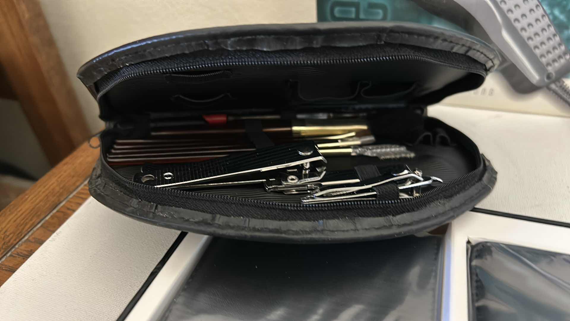 Photo 1 of 5 NEW ITEMS- PROFESSIONAL STYLE CLIPPERS, BINOCULARS, MANICURE SETS, WALLET SET