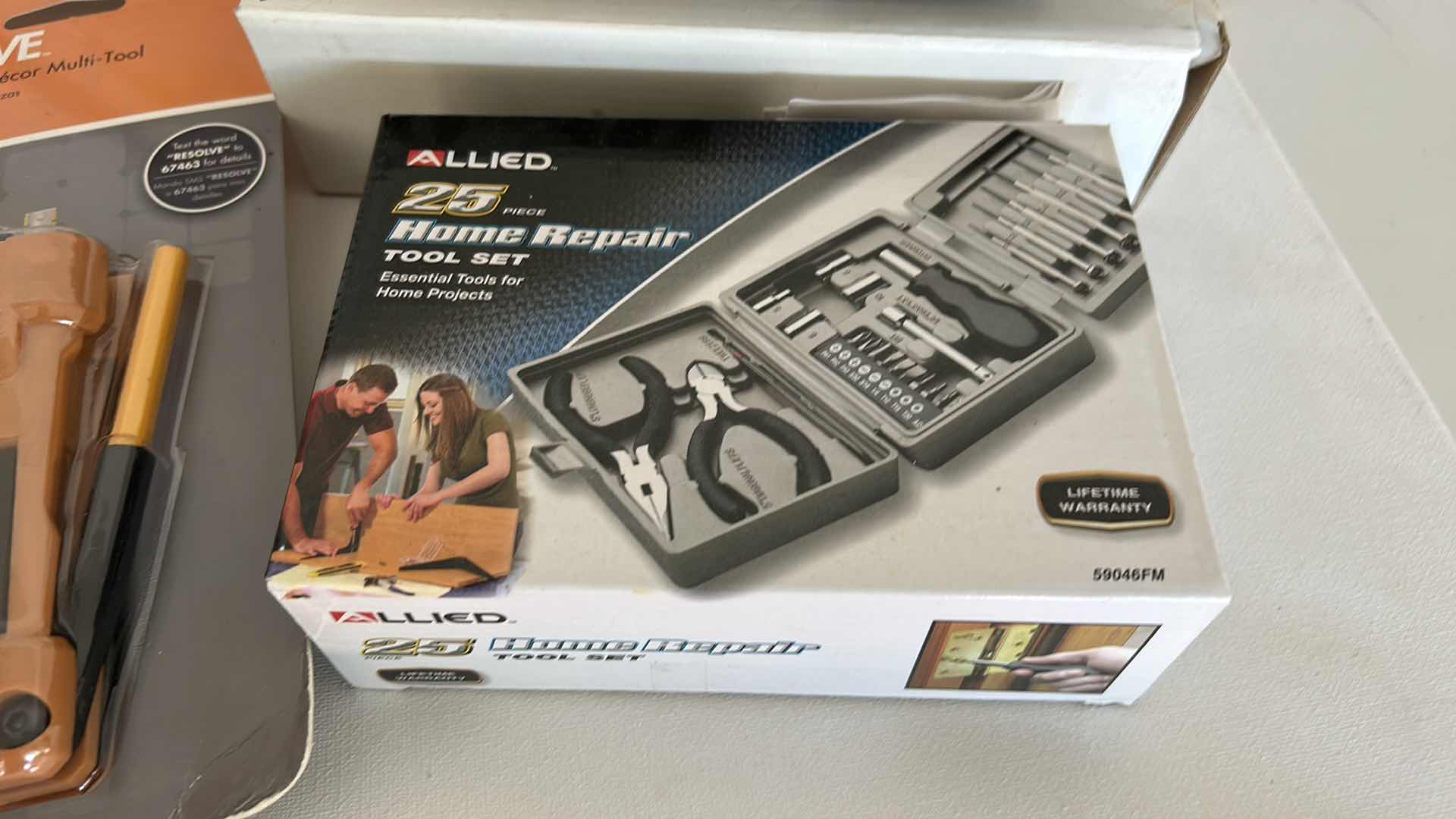 Photo 1 of 4 NEW GARAGE ITEMS - 2 DRILLS, MULTI TOOL AND HOME REPAIR TOOL SET