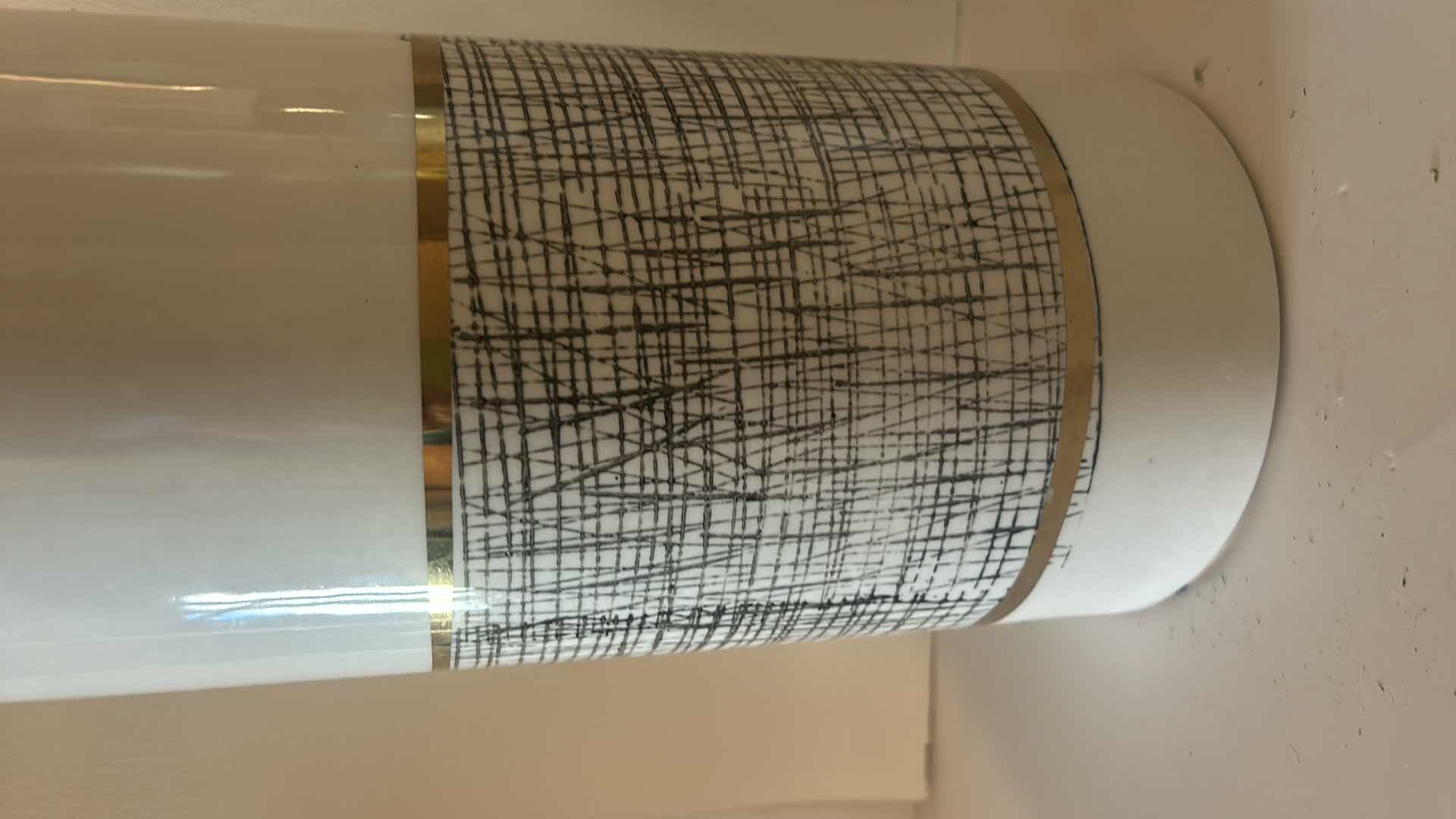 Photo 1 of HOME DECOR- 2 BLACK, WHITE & GOLD LIDDED JARS (TALLEST H 13”