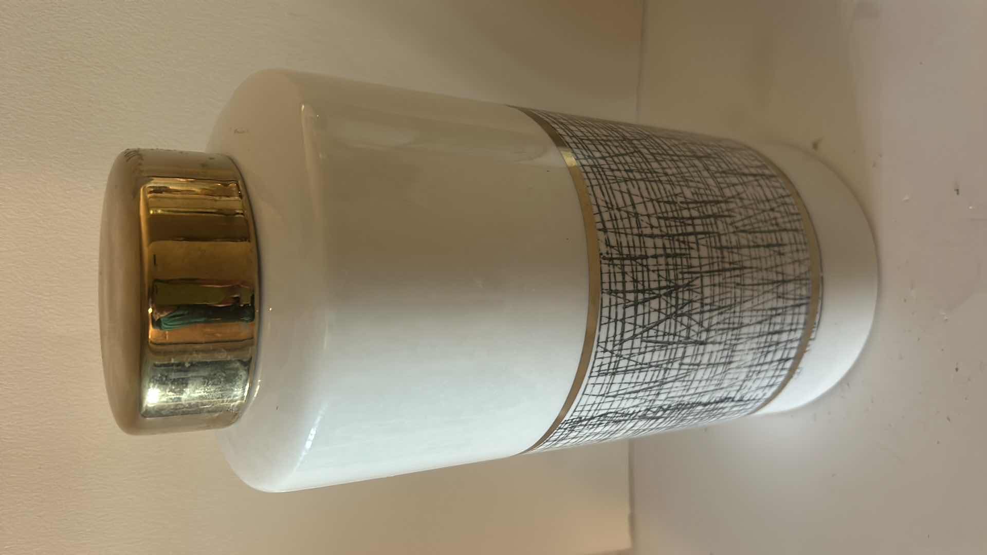 Photo 1 of HOME DECOR- 2 BLACK, WHITE & GOLD LIDDED JARS (TALLEST H 13”