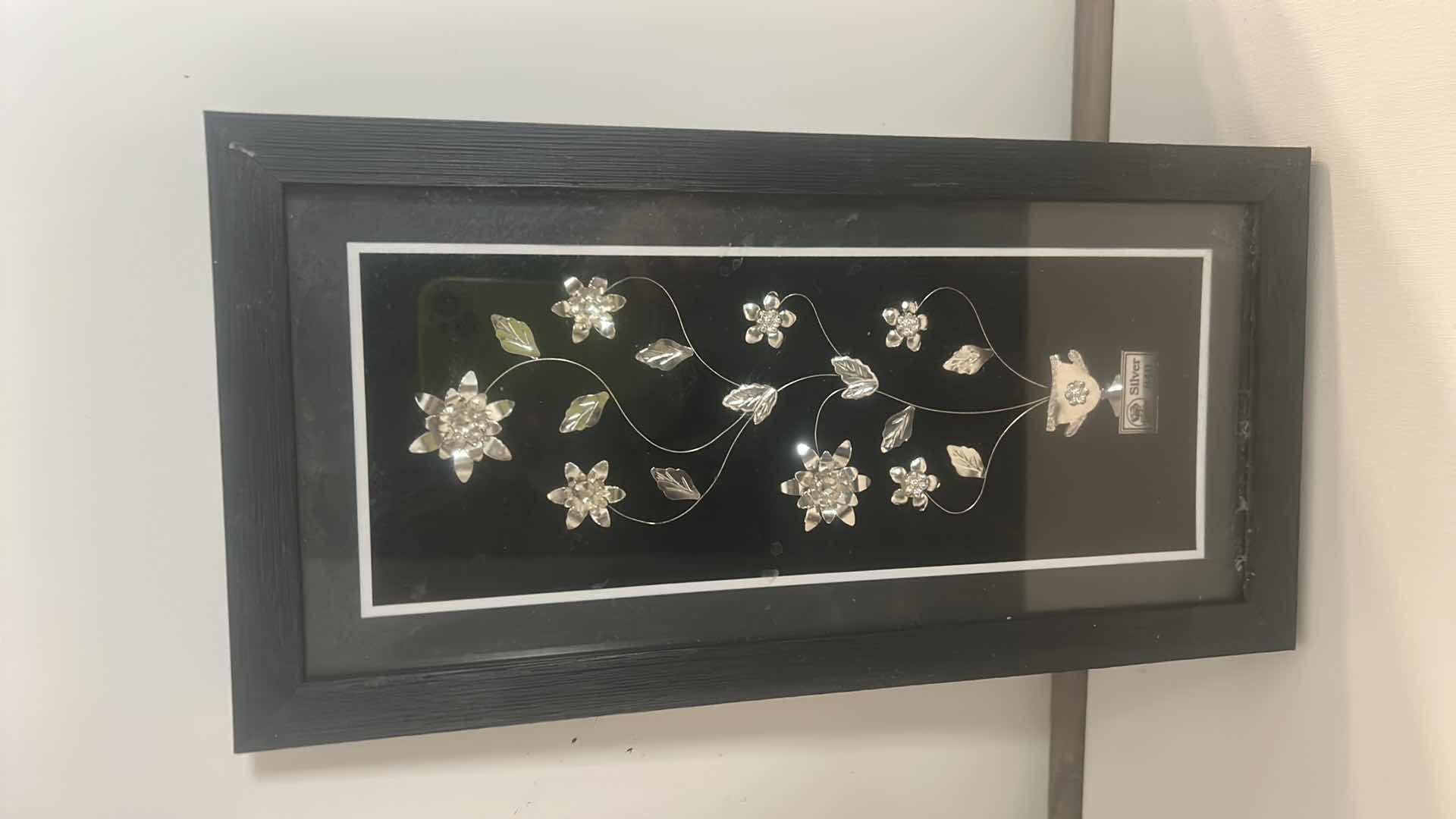 View 1 of BLACK FRAMED SHADOW BOX WITH SILVER 840 FLOWERS 7” x 14 1/4”