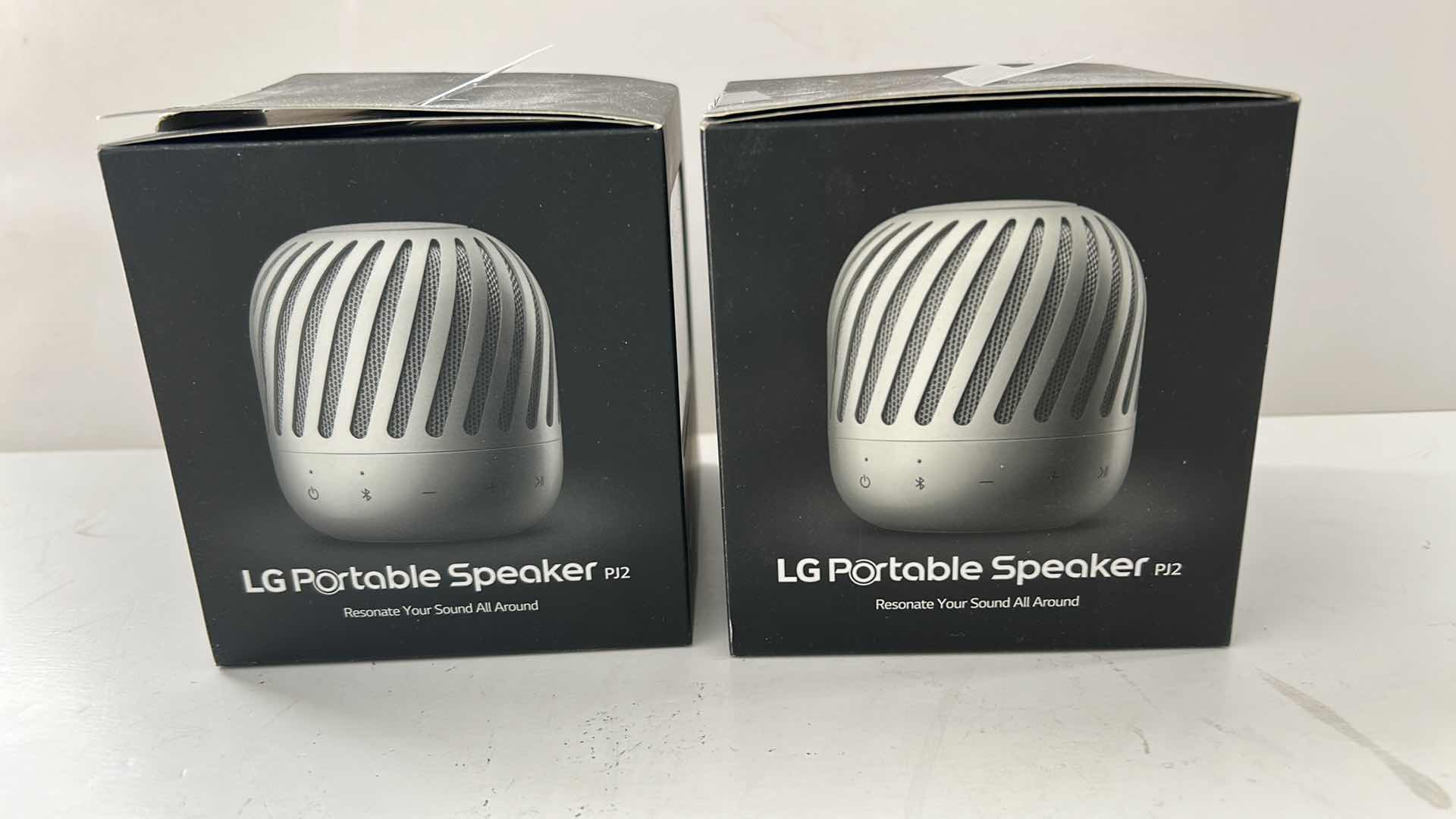 Photo 1 of 2 NEW LG PORTABLE SPEAKERS