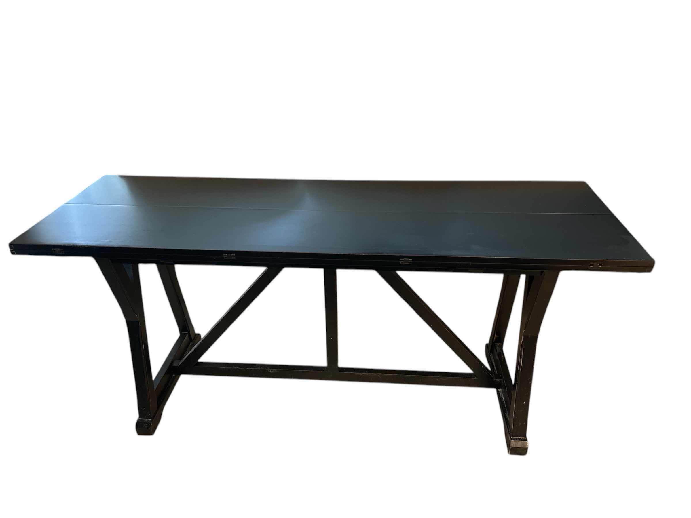 Photo 1 of DARK WOOD FOLDING SOFA/DINING ROOM TABLE (OPENED MEASURES 68” x 44 1/2” x 29 1/2”