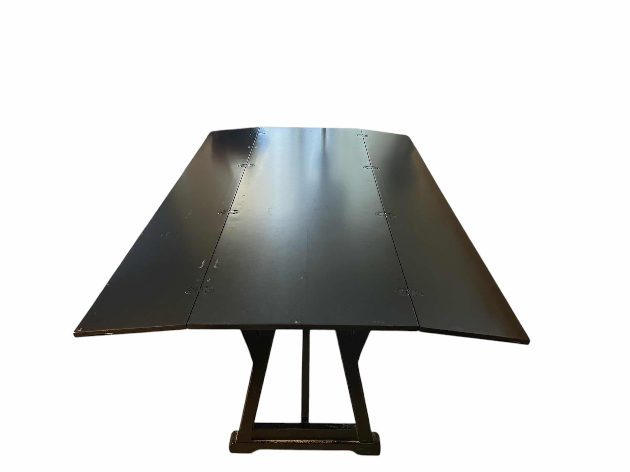 Photo 1 of DARK WOOD FOLDING SOFA/DINING ROOM TABLE (OPENED MEASURES 68” x 44 1/2” x 29 1/2”