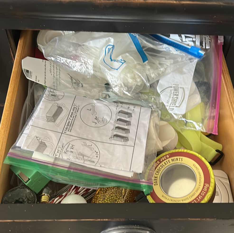 Photo 1 of CONTENTS OF DRAWER (BUFFET)