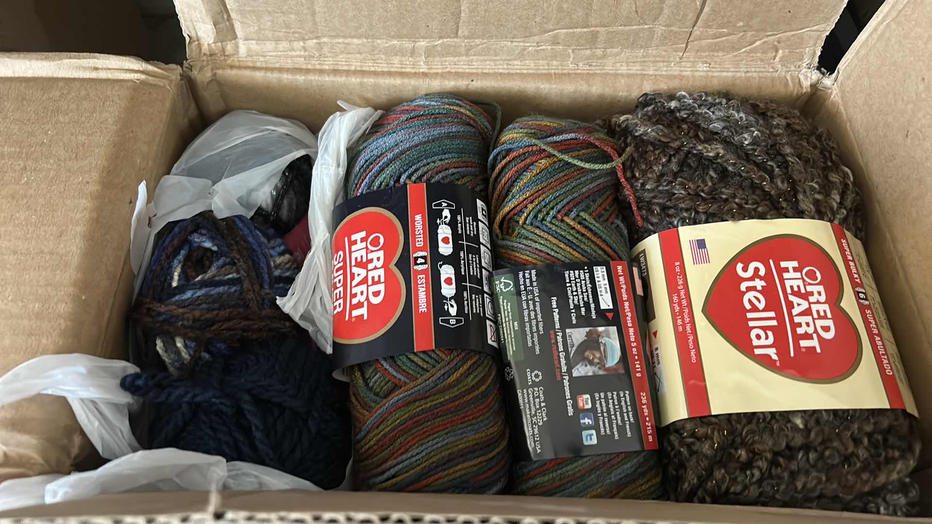 Photo 1 of BOX OF YARN AND CROCHET NEEDLES