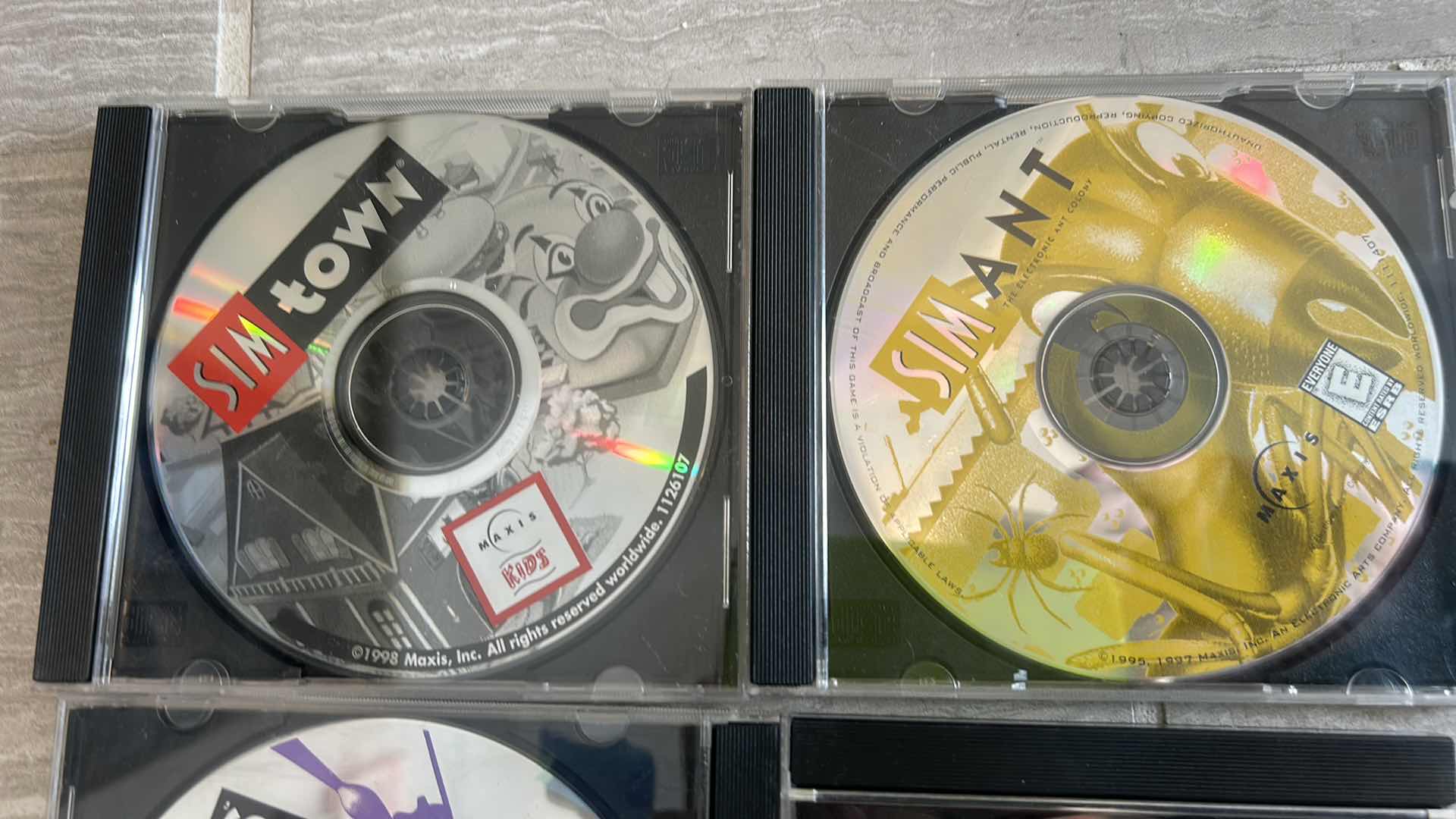 Photo 1 of 4 CD’s SIM TUNES, SIM TOWN, SIM SAFARI, SIM ANT