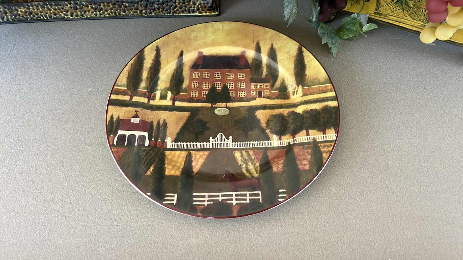 Photo 1 of 2-FAUX GRAPE PLANT ARRANGEMENTS IN DECORATIVE METAL CONTAINERS, 12” COUNTRY VILLAGE COLLECTOR'S PLATE