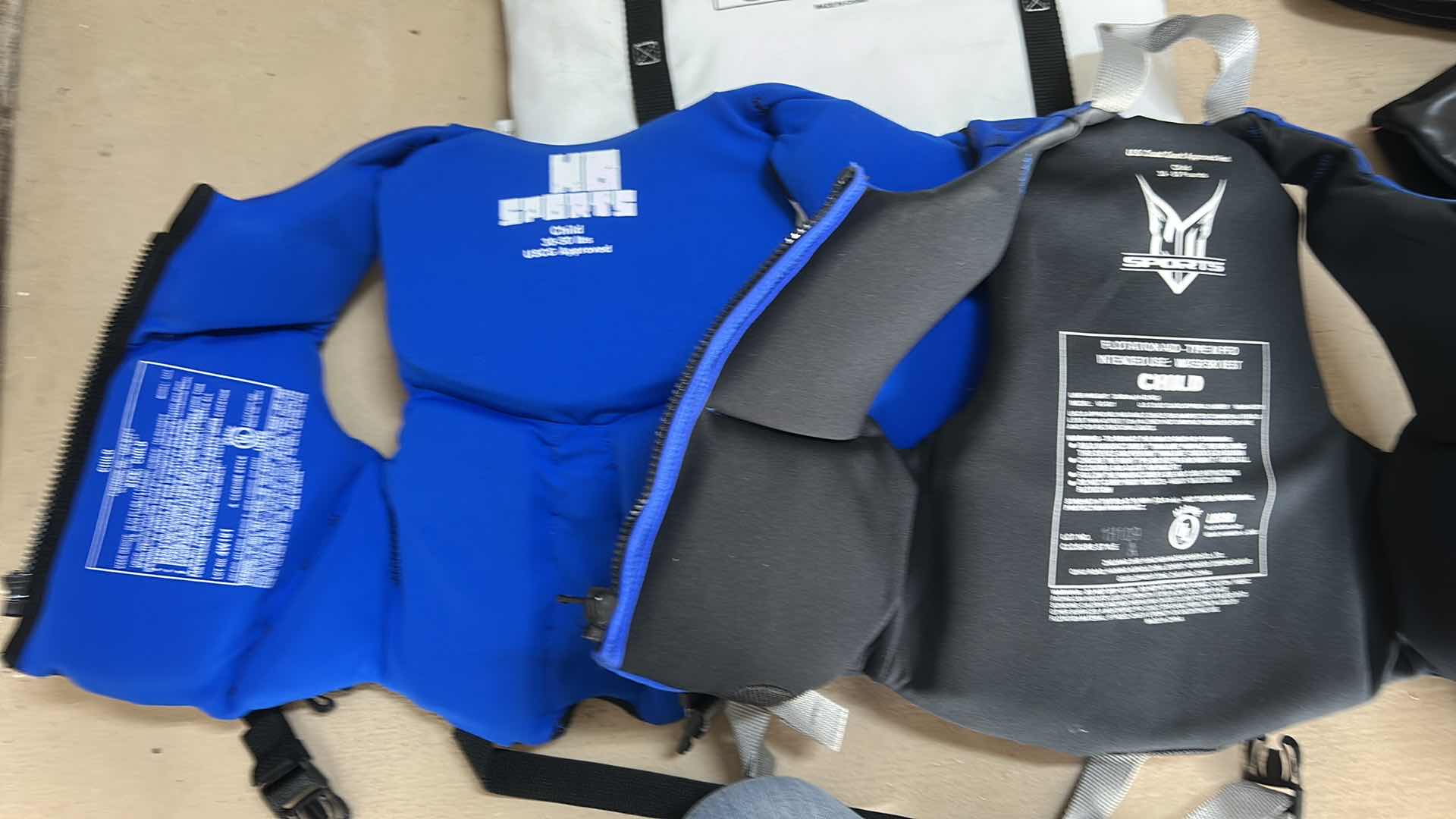 Photo 1 of 2 CHILDRENS LIFE VESTS & FLOTATION SEAT