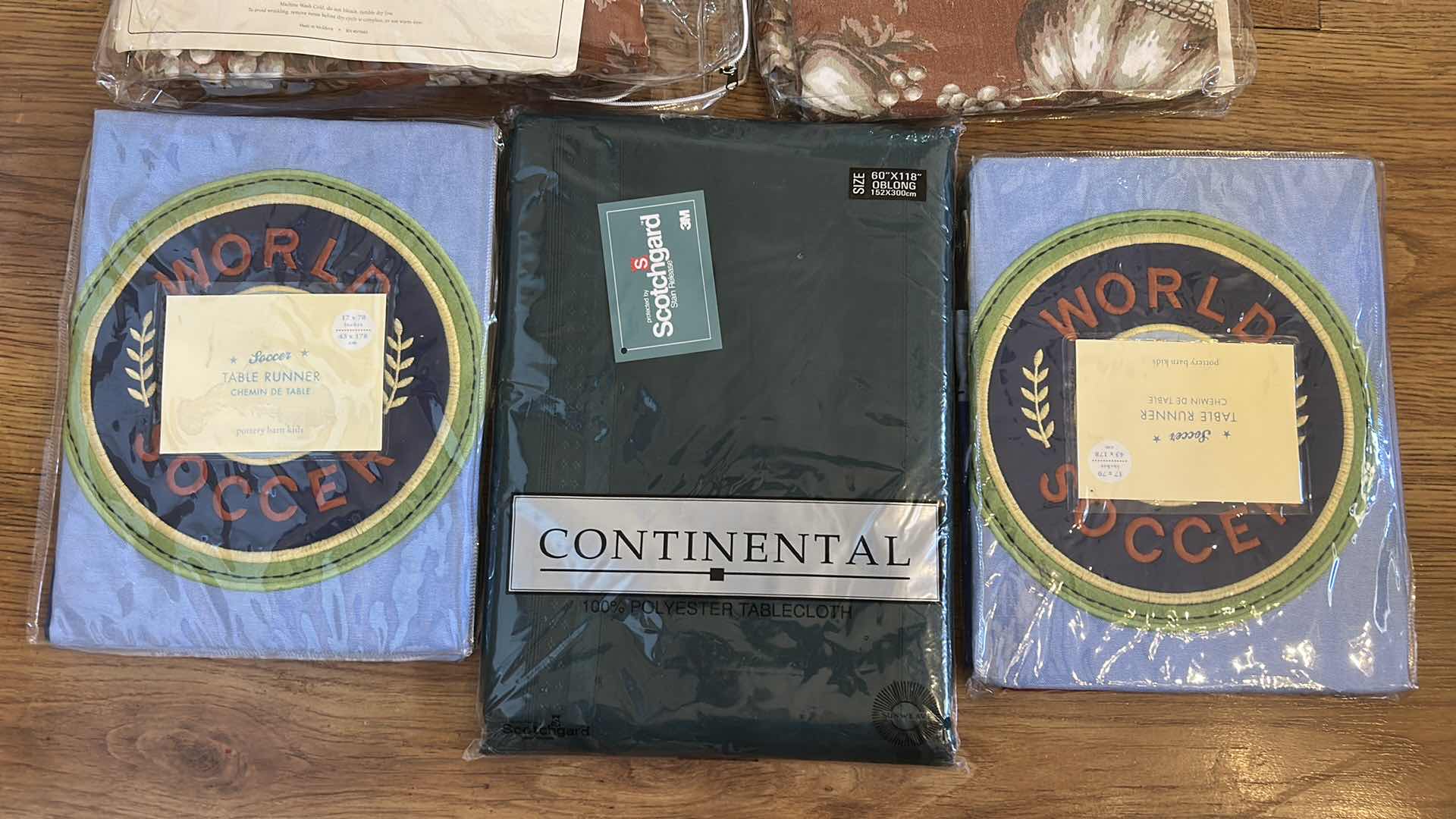 Photo 1 of 3 TABLECLOTHS AND 2 TABLE RUNNERS