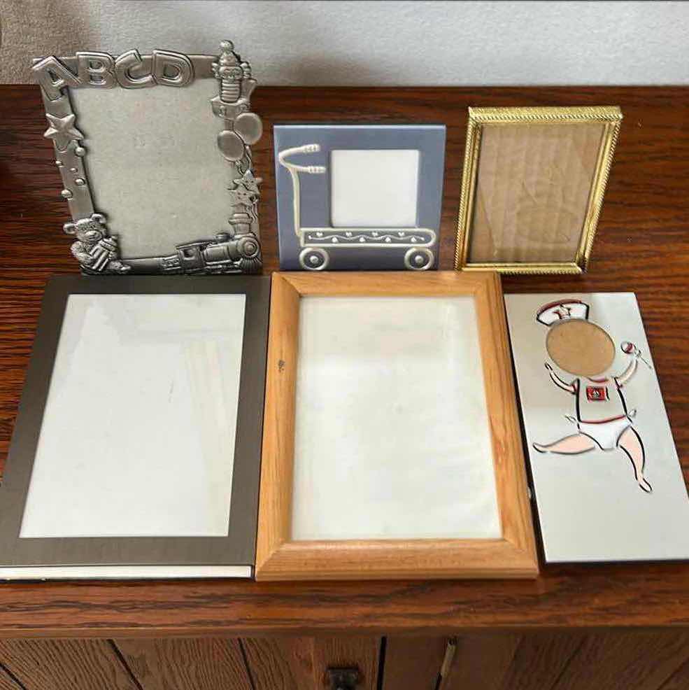 Photo 1 of BASKET FULL OF PICTURE FRAMES