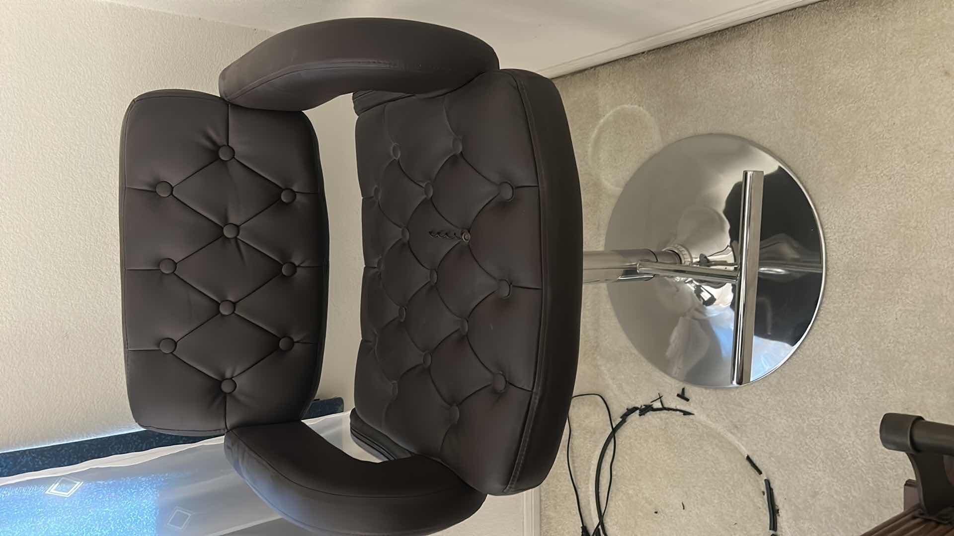 Photo 2 of BLACK AND CHROME ADJUSTABLE HEIGHT SWIVEL BARSTOOL SEAT HEIGHT AS PICTURED 25.5”