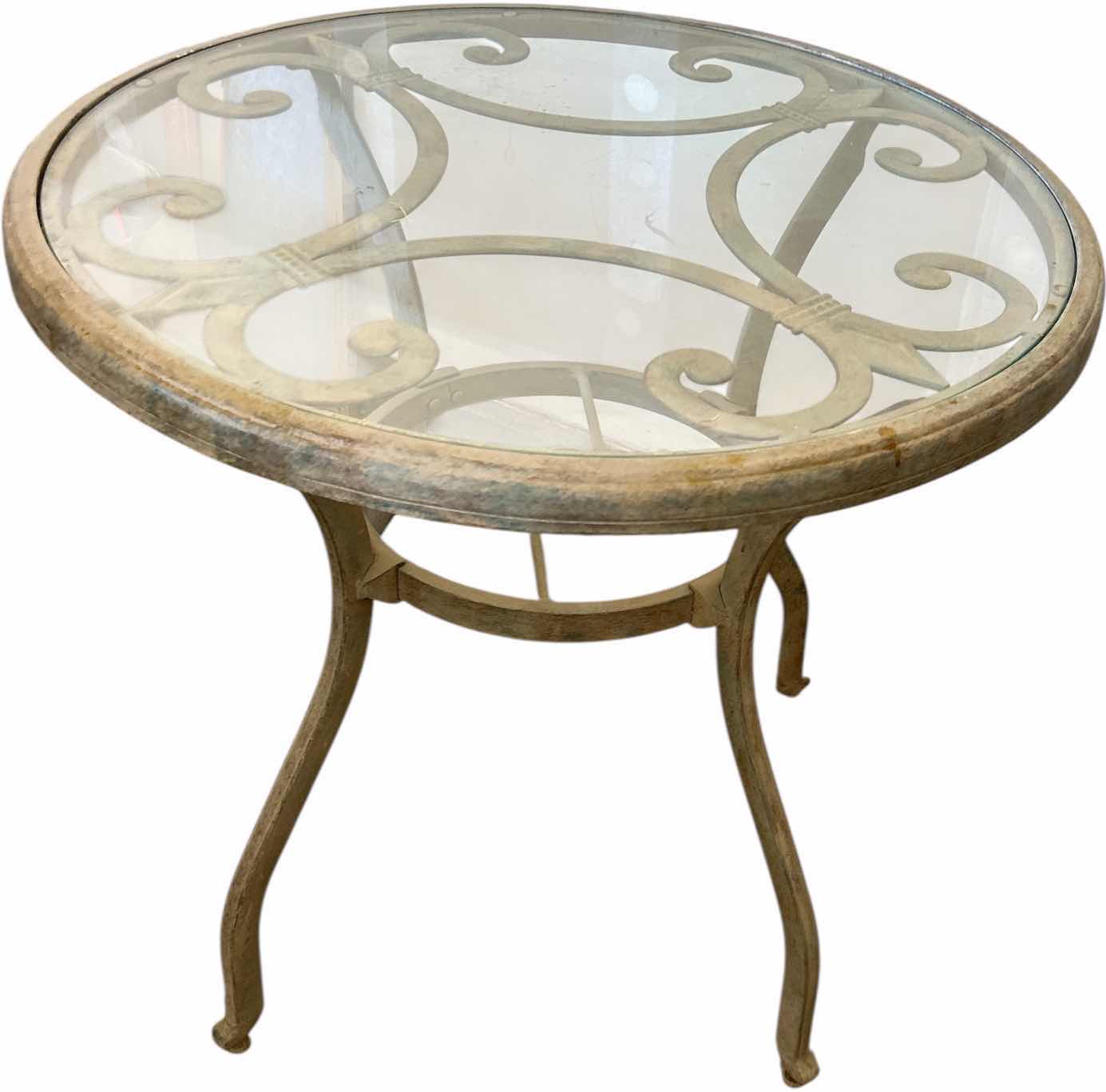 Photo 1 of OUTDOOR PATIO GLASS TOP TABLE 29.5” x H29”