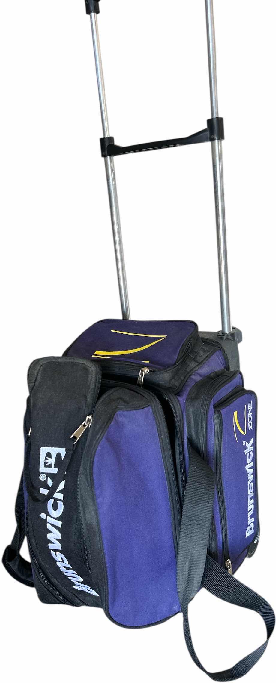 Photo 1 of BRUNSWICK ROLLING BOWLING CASE AND BOWLING BALL