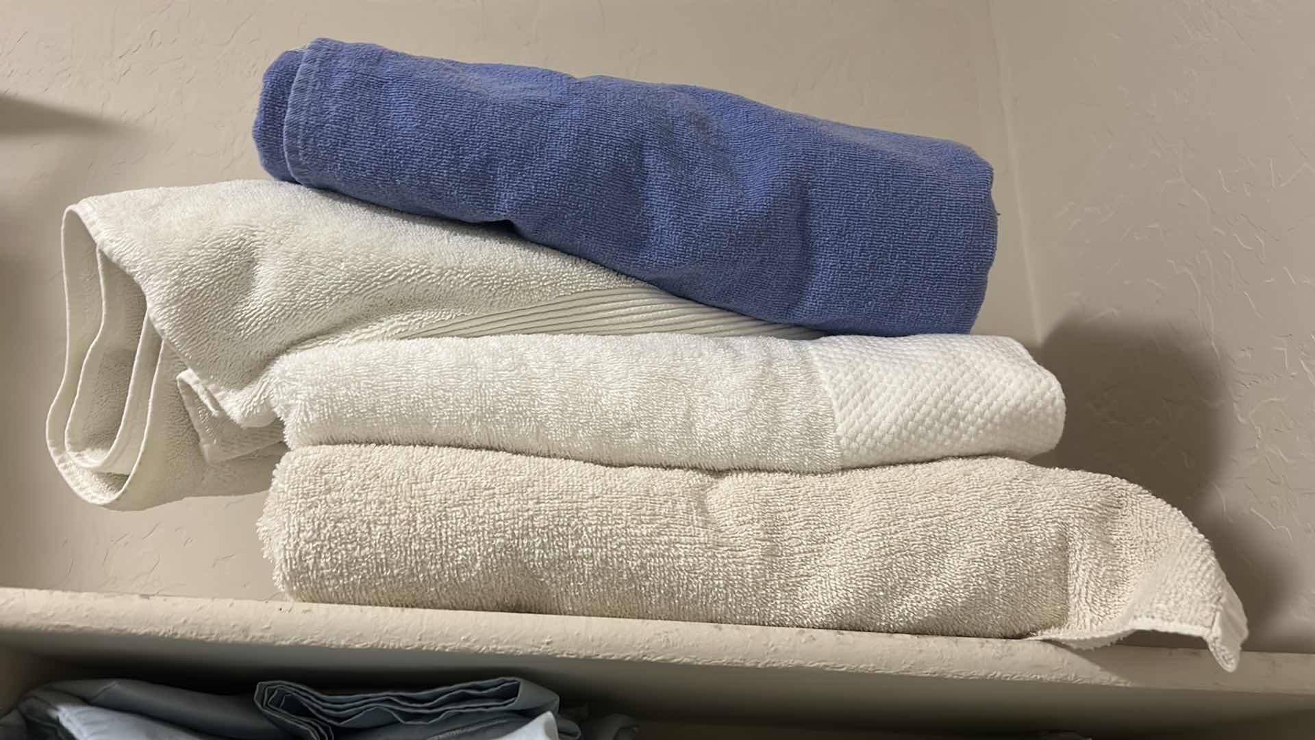 Photo 2 of LINENS ON 5 SHELVES