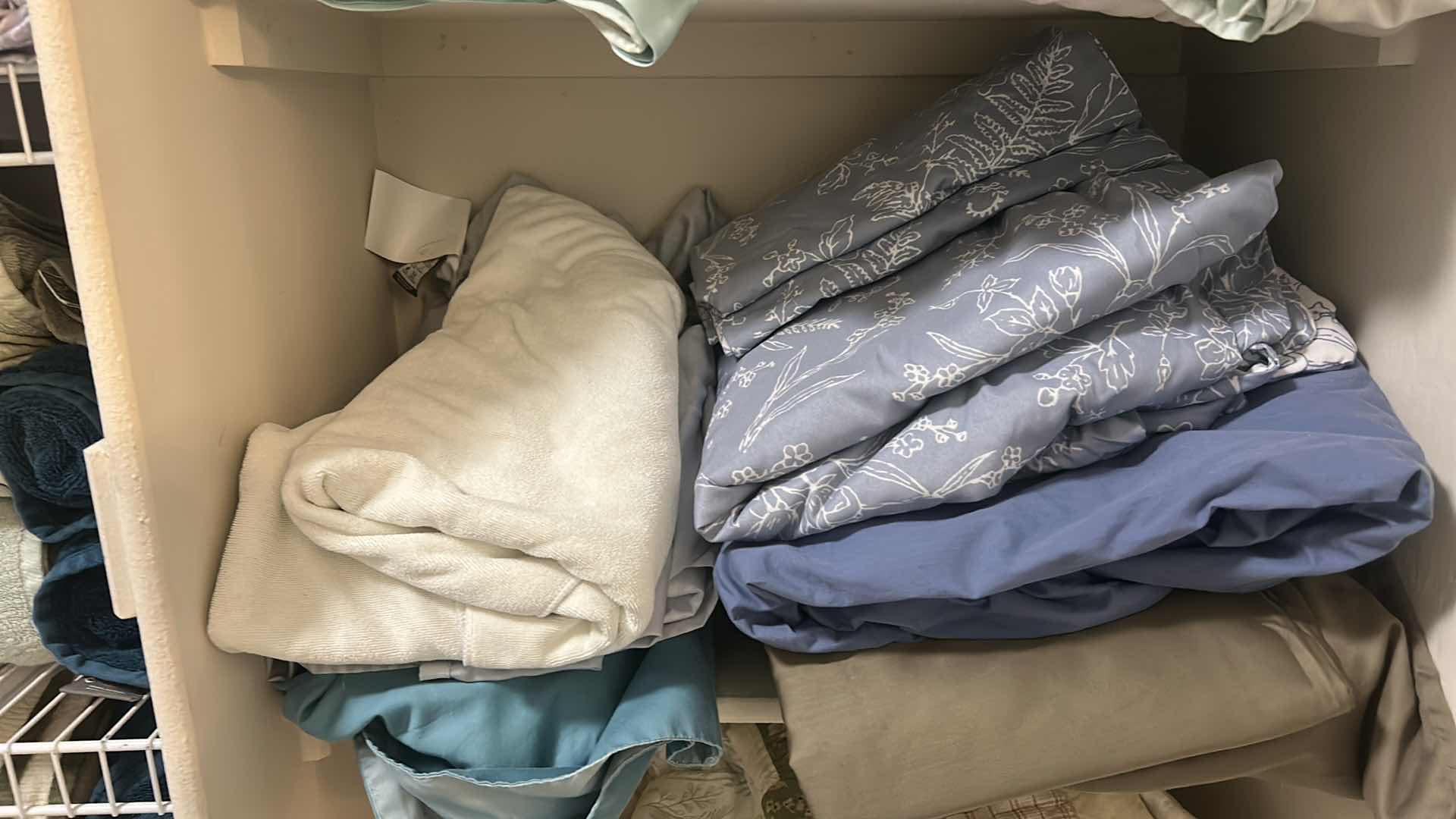 Photo 4 of LINENS ON 5 SHELVES