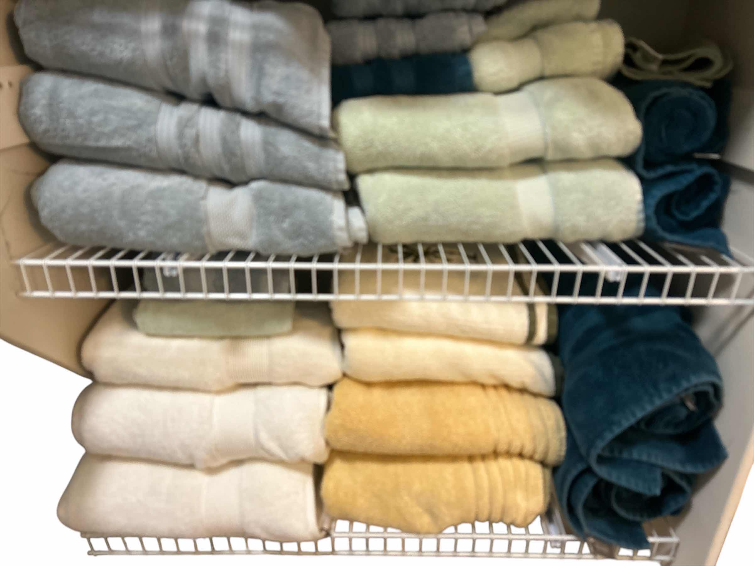 Photo 1 of 2 SHELVES OF TOWELS