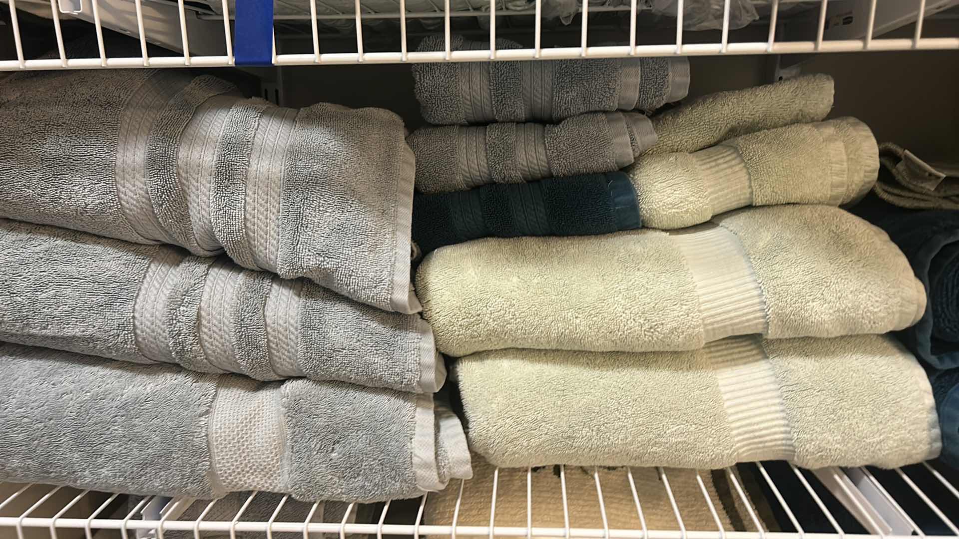 Photo 2 of 2 SHELVES OF TOWELS
