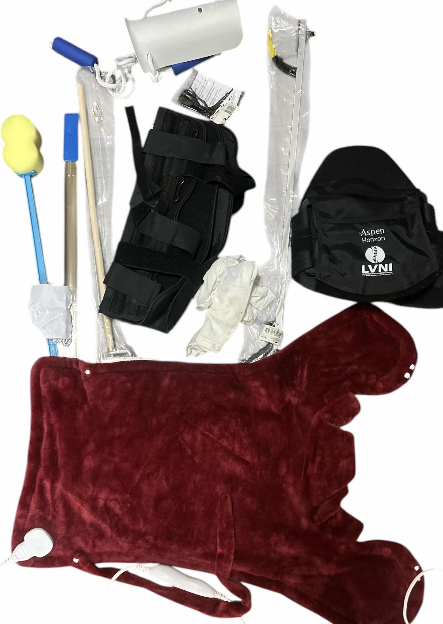 Photo 1 of MEDICAL SUPPLIES, HEATING PAD, BACK BRACE, LEG BRACE AND MORE