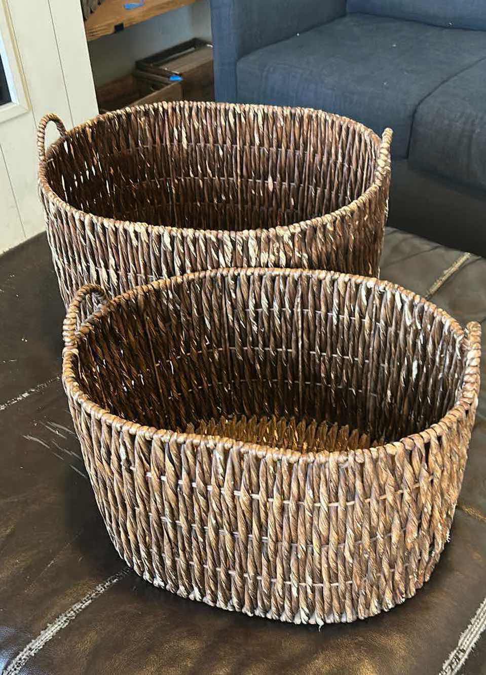 Photo 1 of 2- RATAN BASKETS W HANDLES 23” 19” WIDE