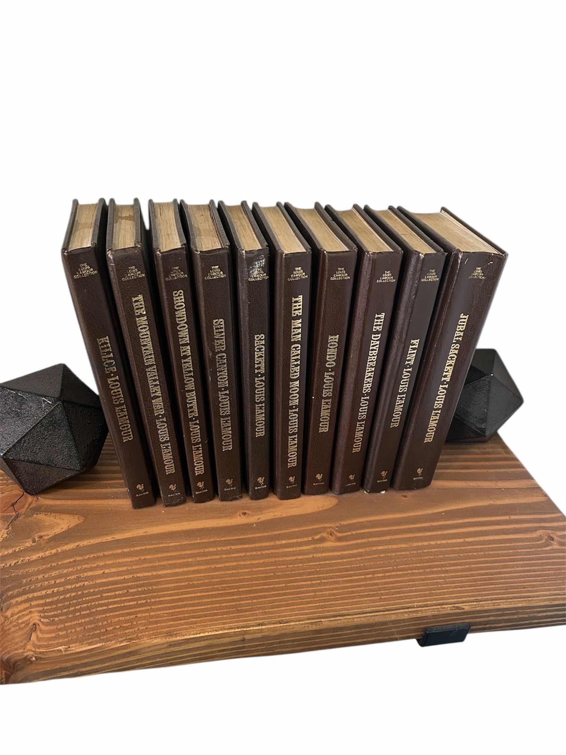 Photo 1 of COLLECTION OF LOUIS L’ AMOUR BOOKS W BLACK BOOKENDS